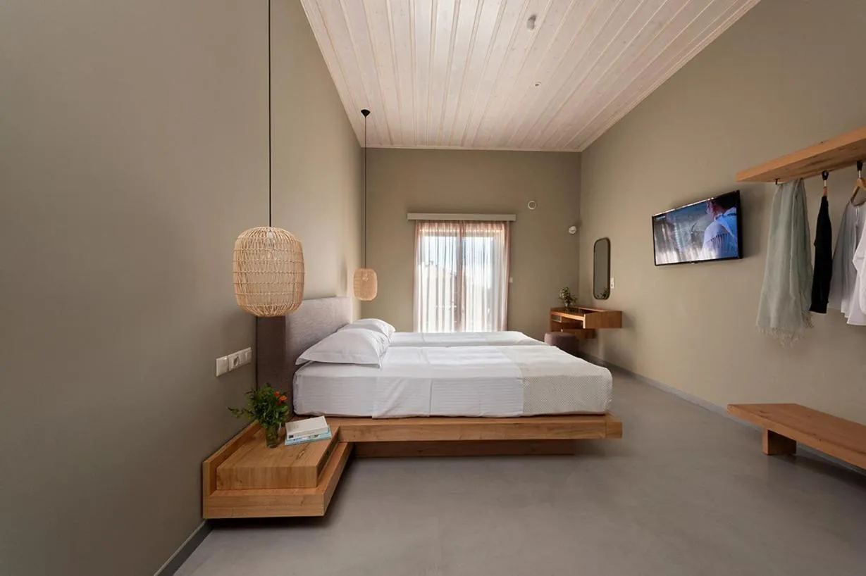 Bed in Diapori Suites Hotel