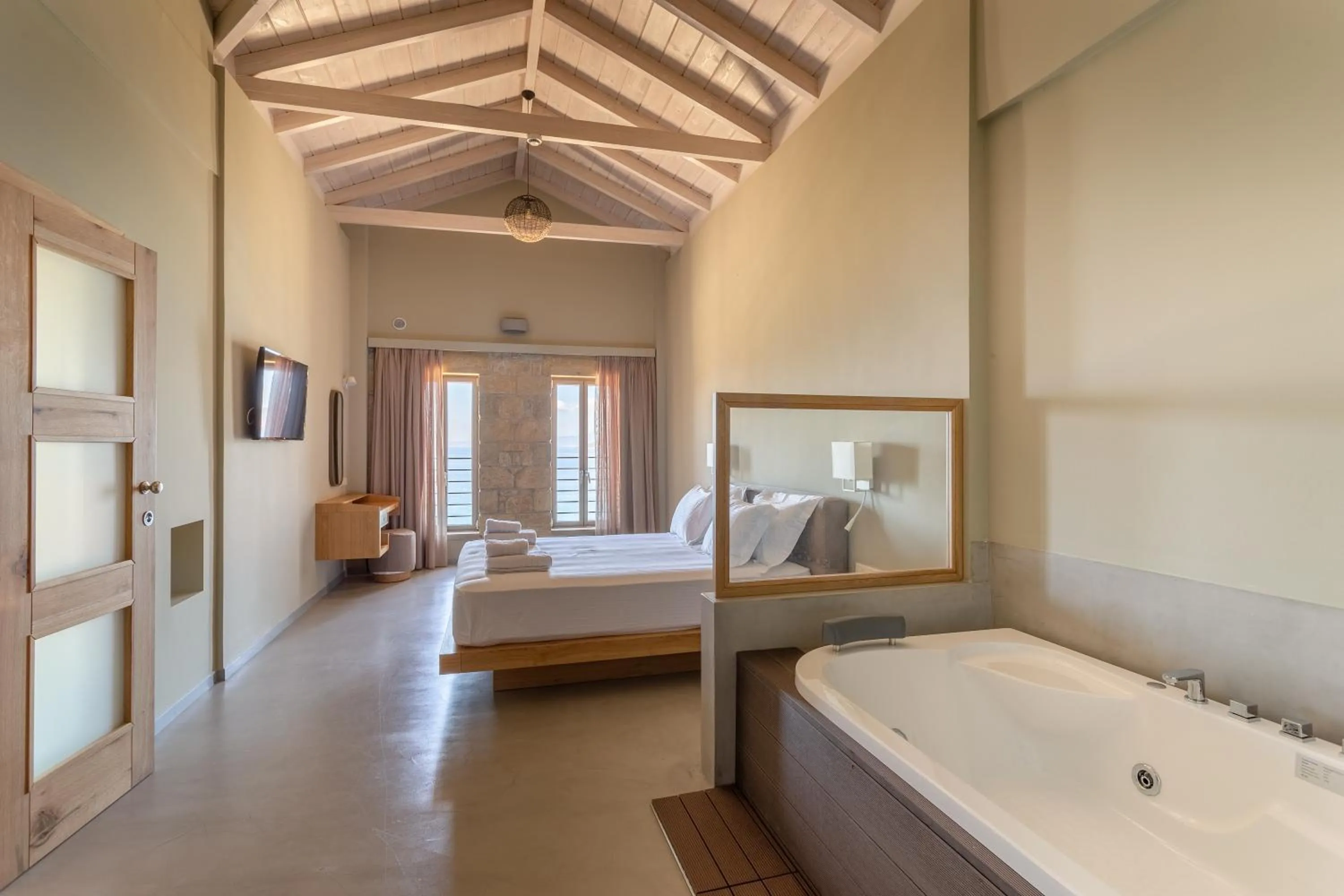 Bed in Diapori Suites Hotel