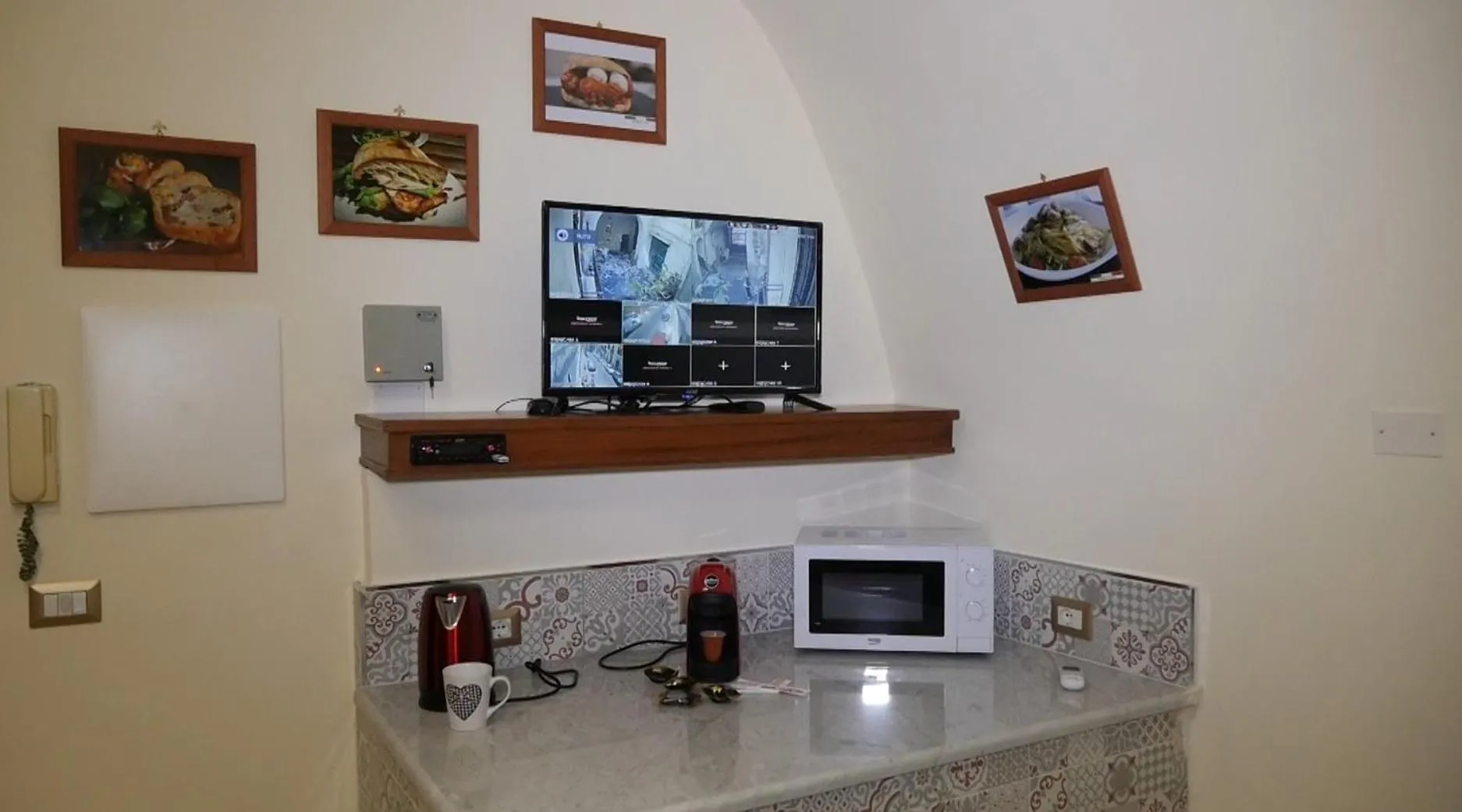 Communal lounge/ TV room in B&B Punto Stella