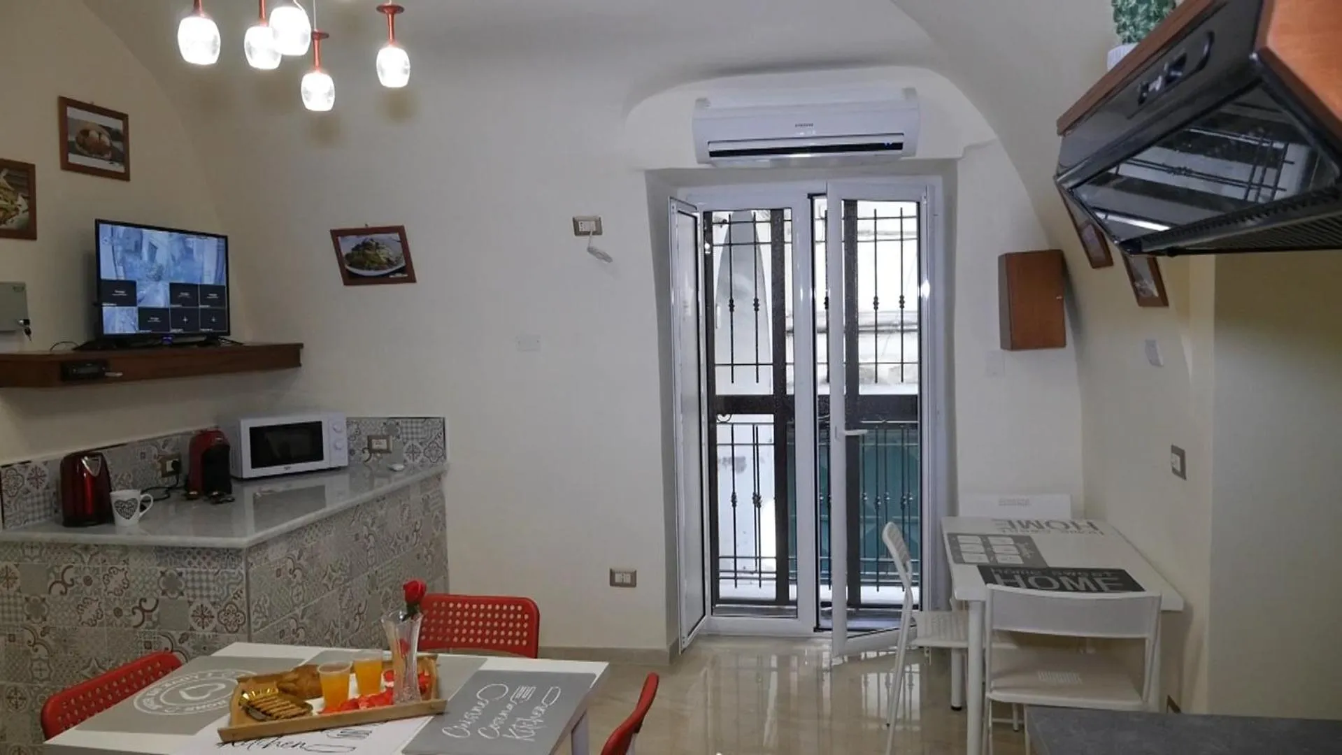 Communal lounge/ TV room in B&B Punto Stella