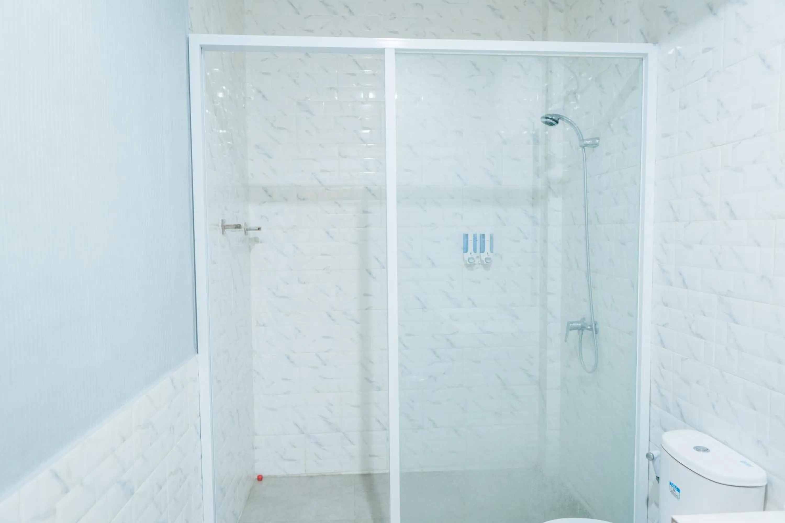 Bathroom in Gemini Star Hotel Kuta