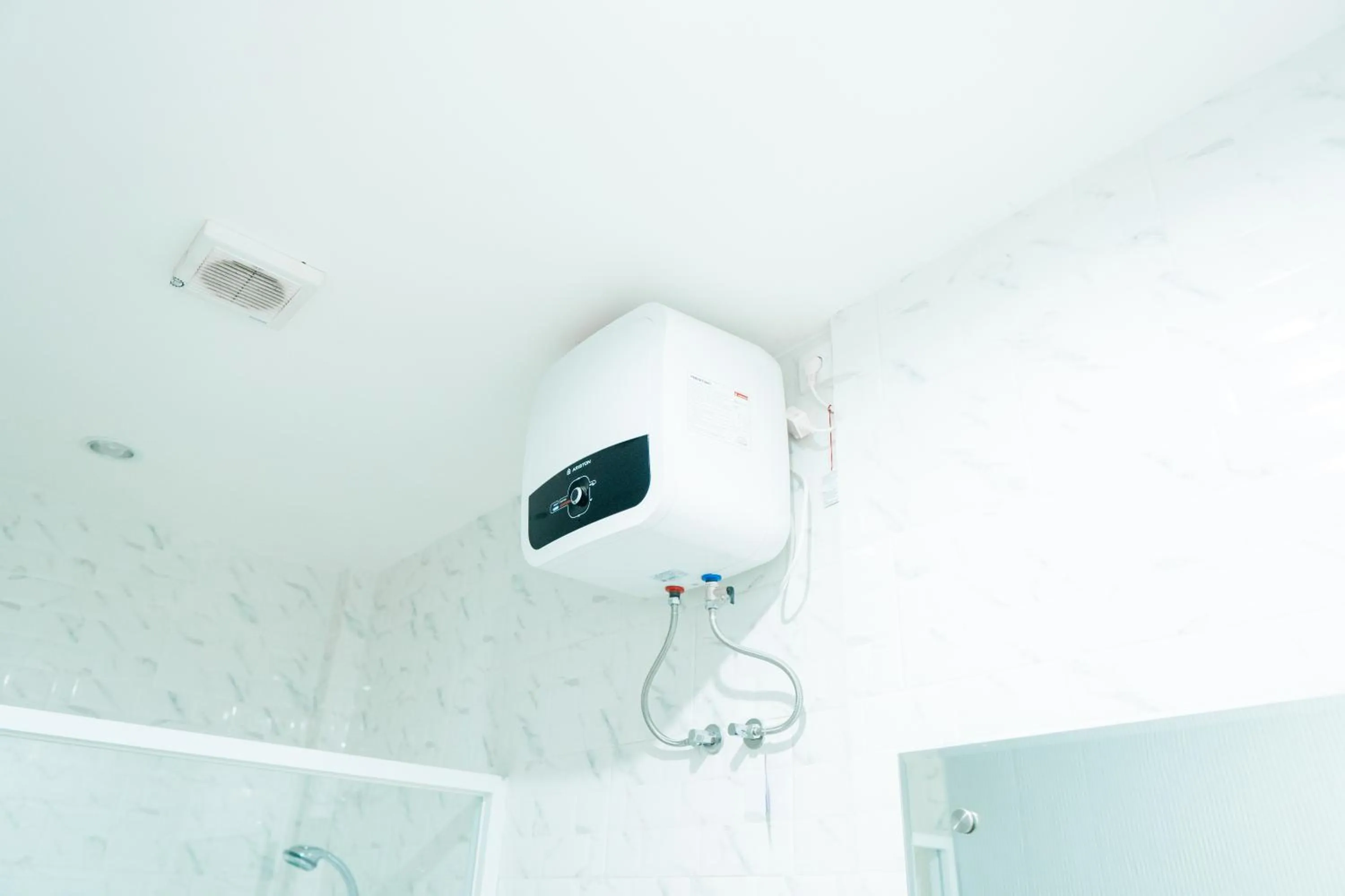 Bathroom in Gemini Star Hotel Kuta