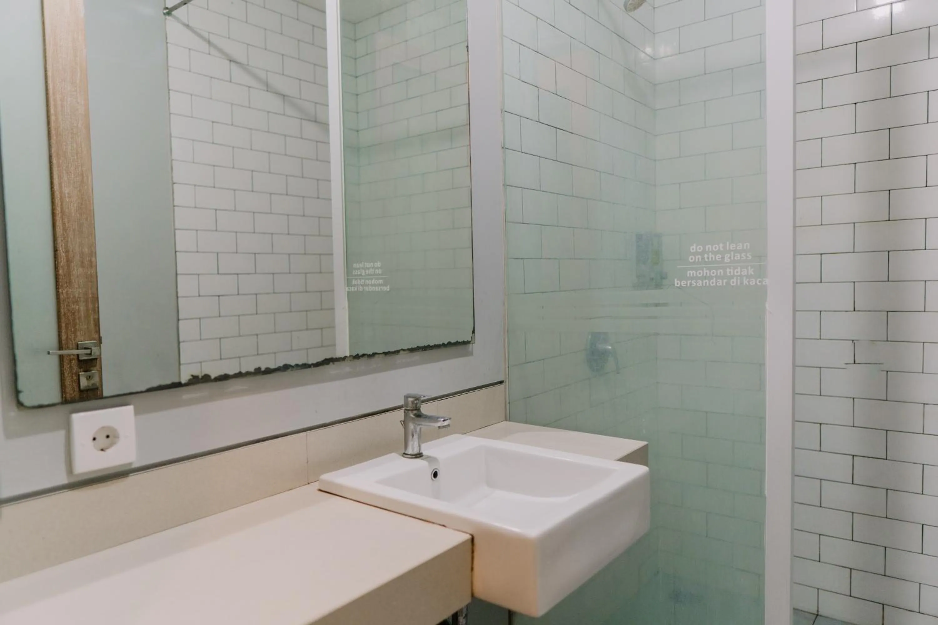 Bathroom in Gemini Star Hotel Kuta