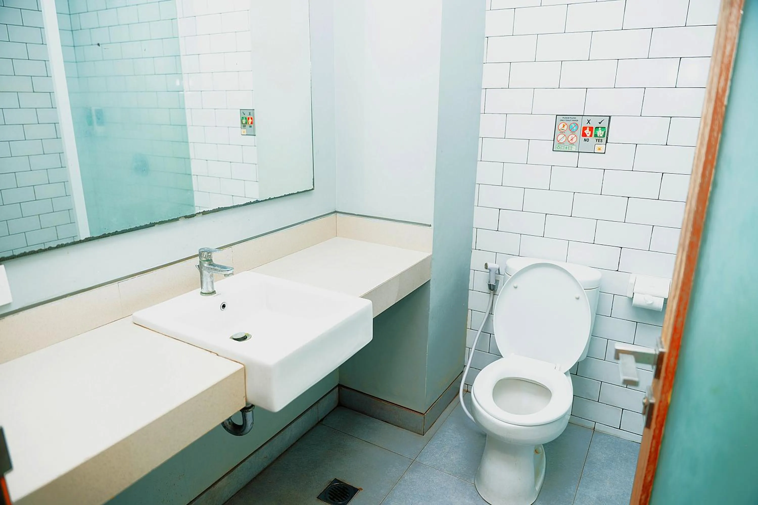 Bathroom in Gemini Star Hotel Kuta