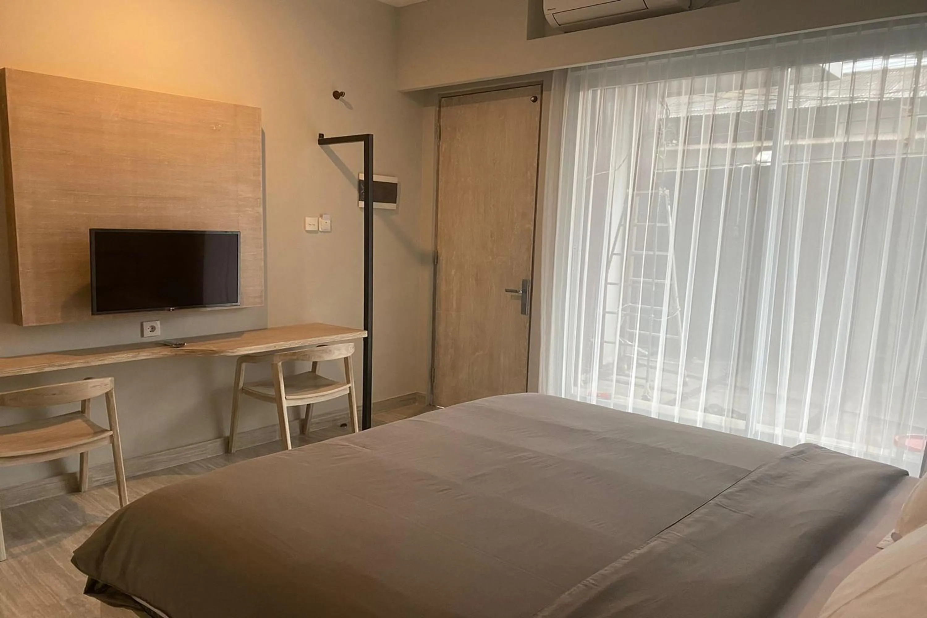 Bed in Gemini Star Hotel Kuta