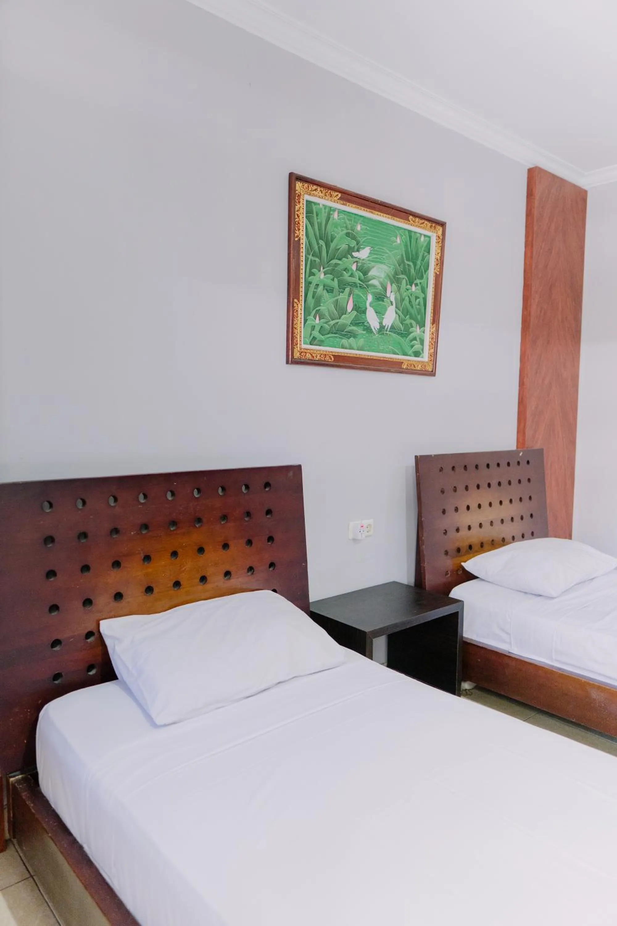 Bedroom, Bed in Gemini Star Hotel Kuta