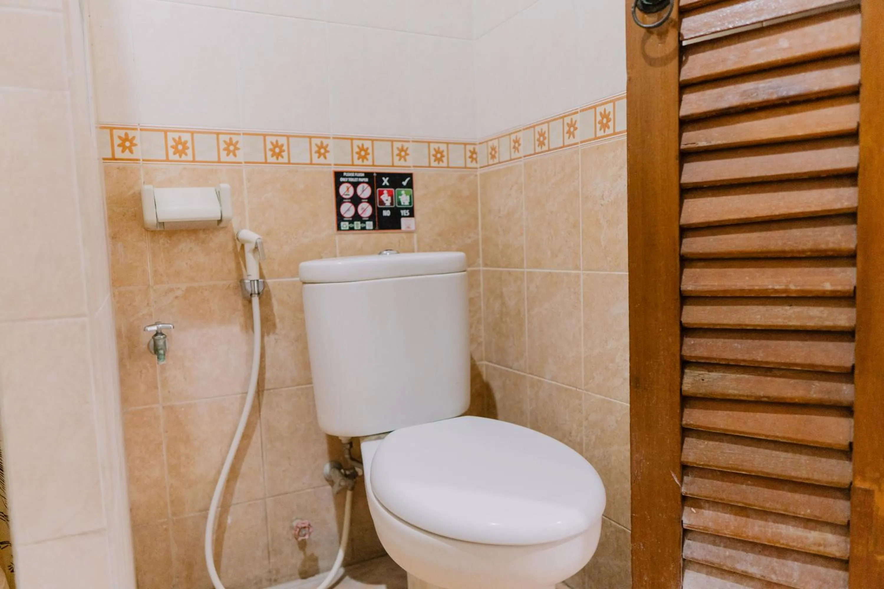 Bathroom in Gemini Star Hotel Kuta