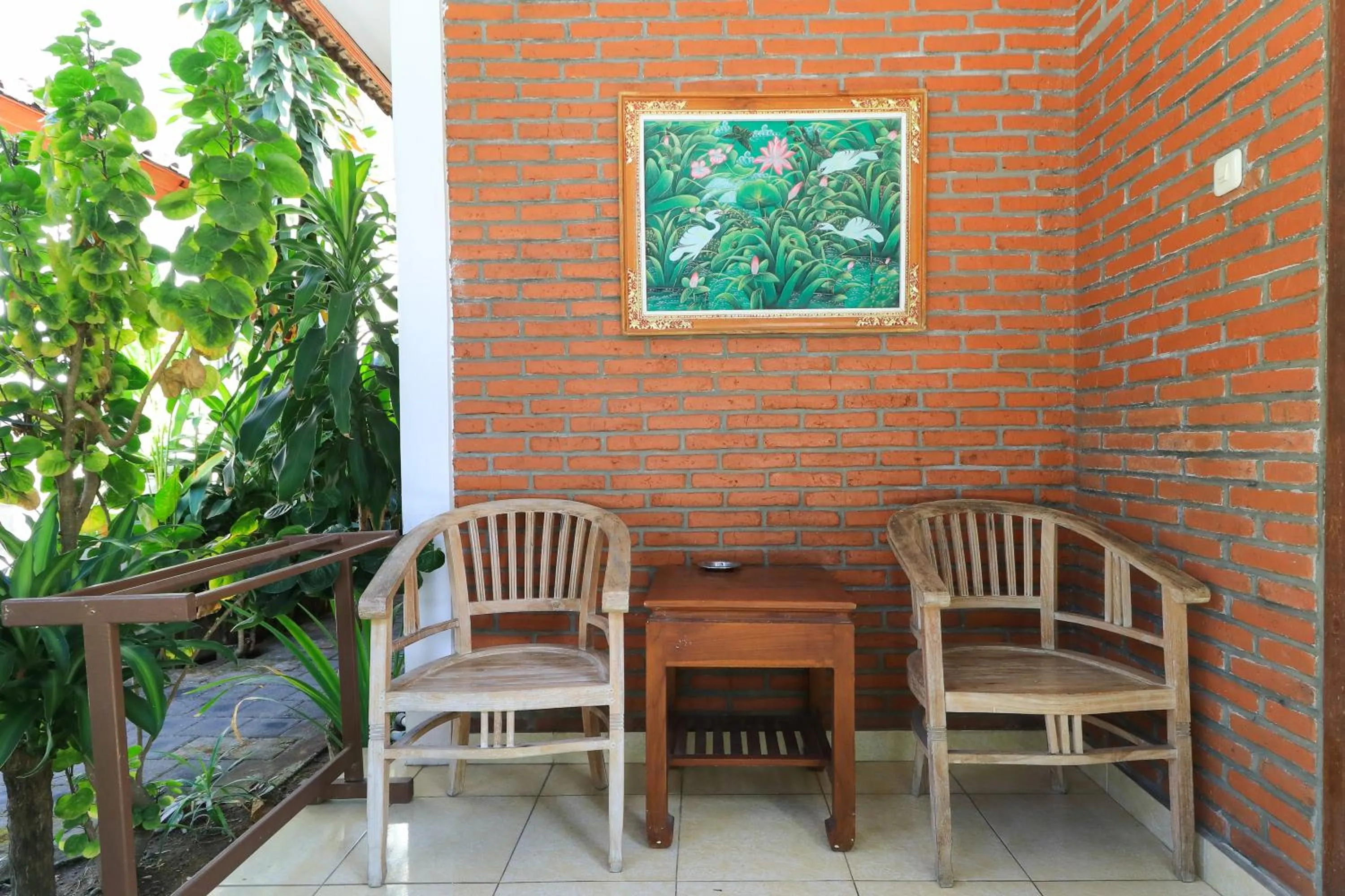 Seating area in Ayu Lili Garden Hotel Kuta