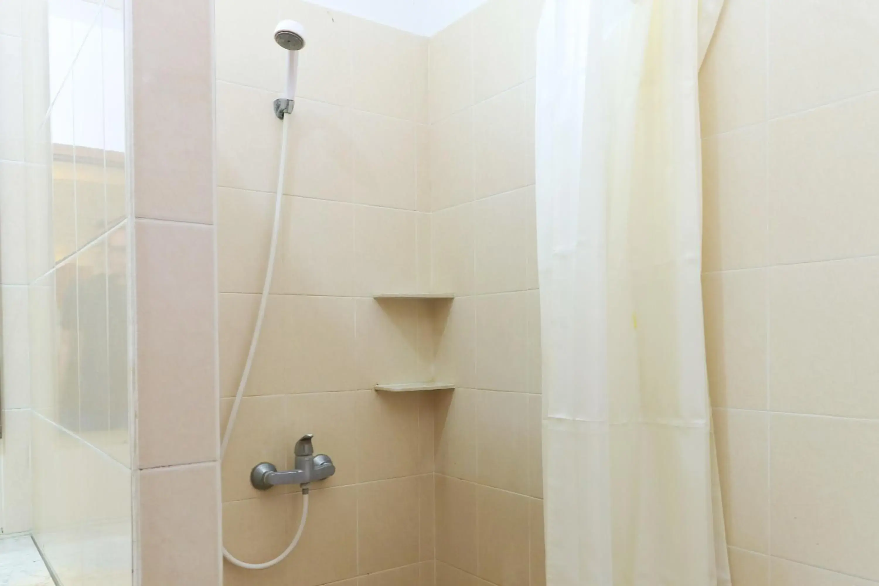 Bathroom in Ayu Lili Garden Hotel Kuta Bathroom in Ayu Lili Garden Hotel Kuta