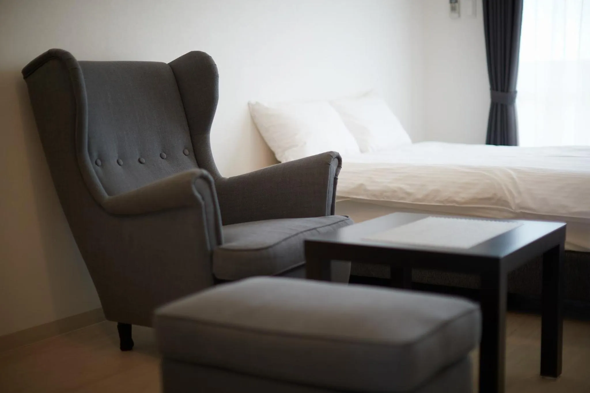 Photo of the whole room, Bed in New Normal Hotel in NAGO ニューノーマルホテルイン名護