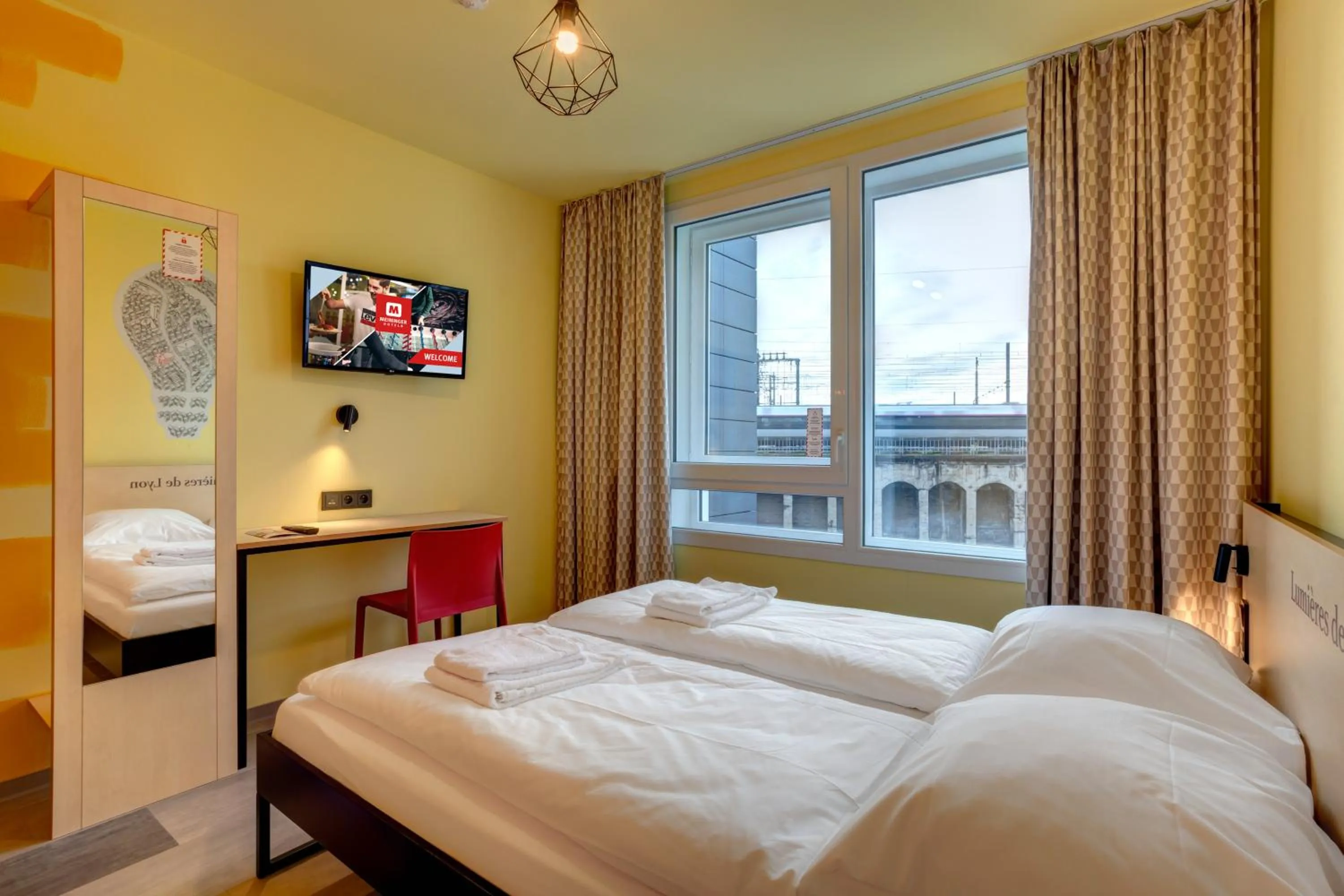 Photo of the whole room, Bed in MEININGER Hotel Lyon Centre Berthelot