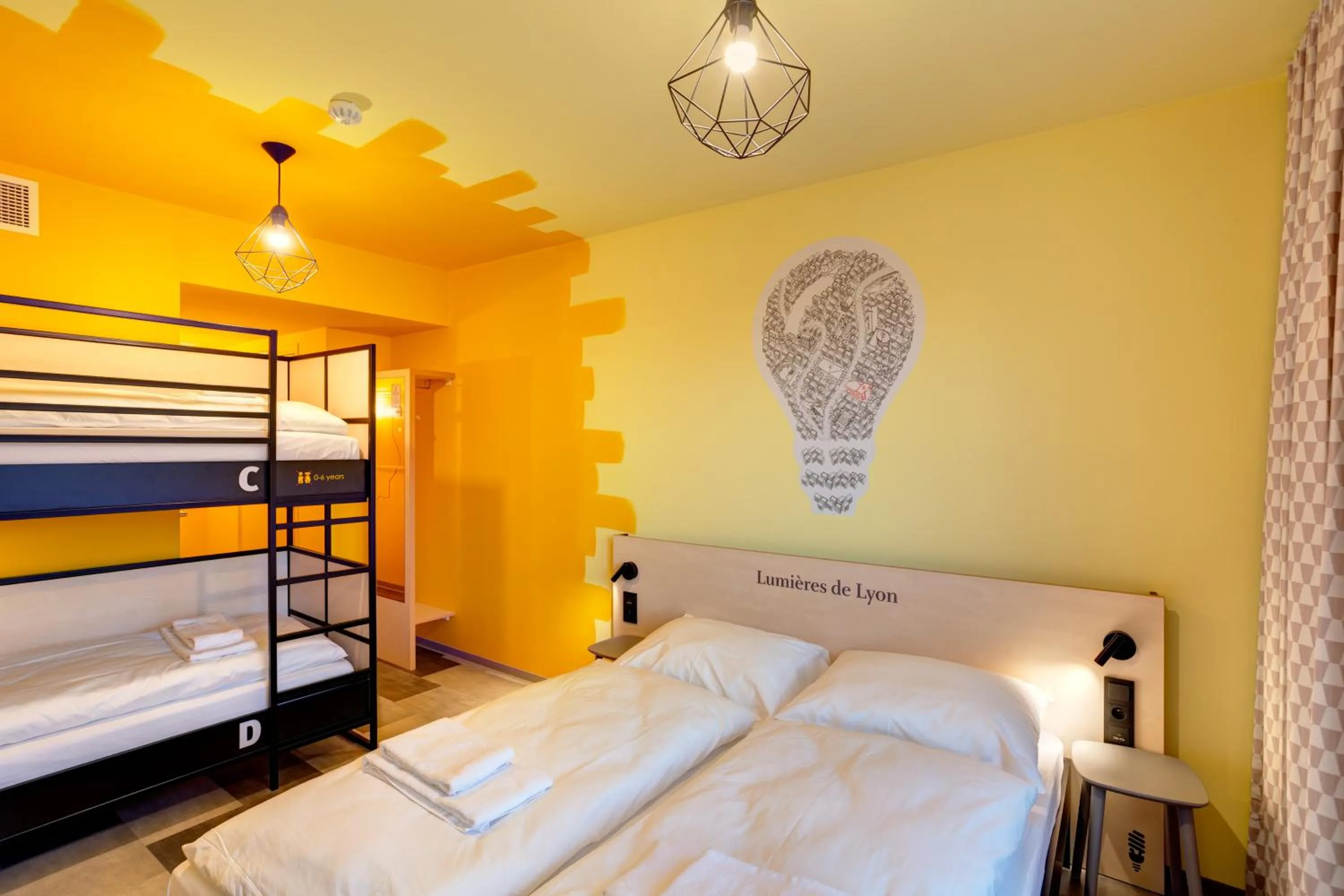 Photo of the whole room, Bed in MEININGER Hotel Lyon Centre Berthelot