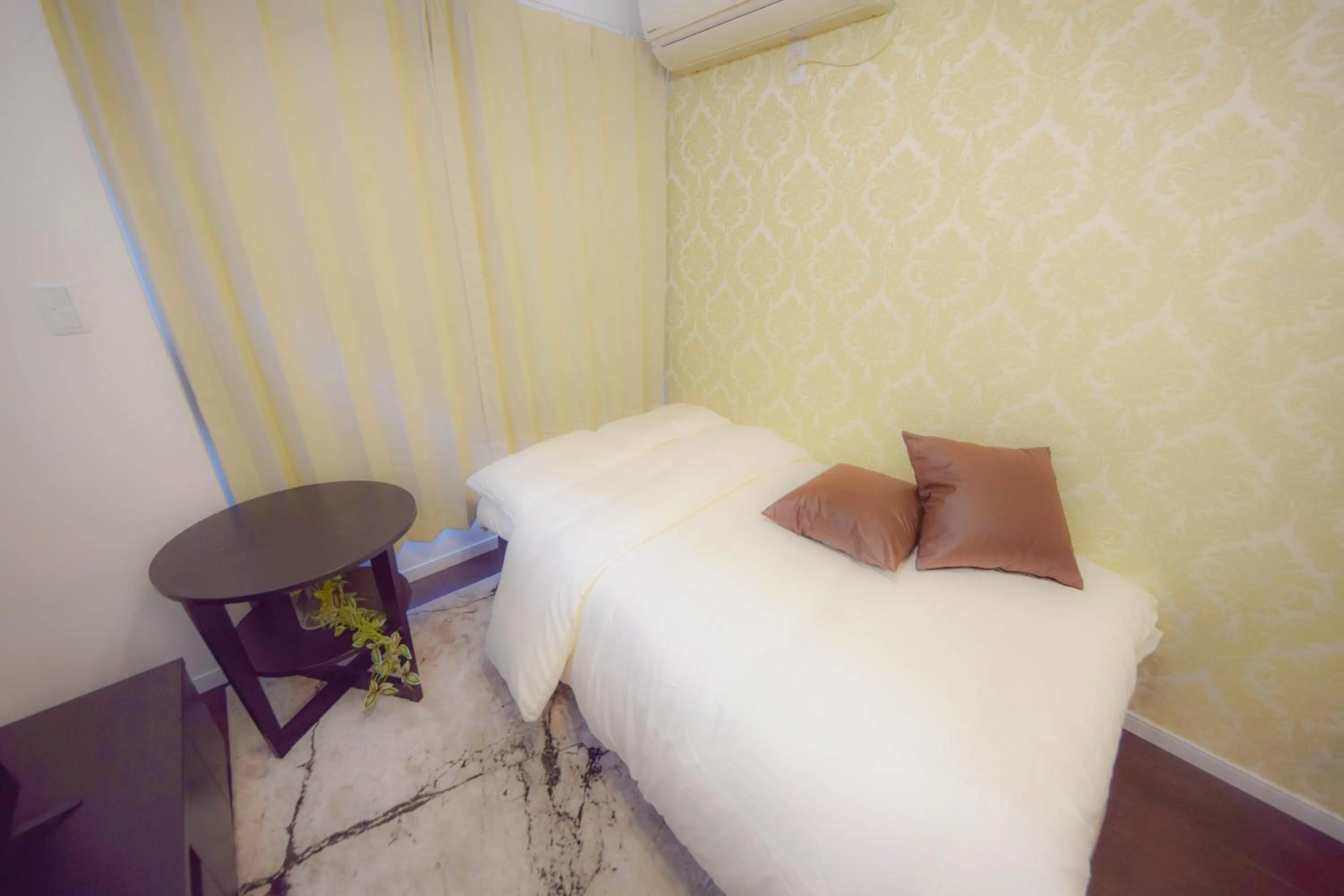 Bed in FINOA Residential Suite Kagurazaka