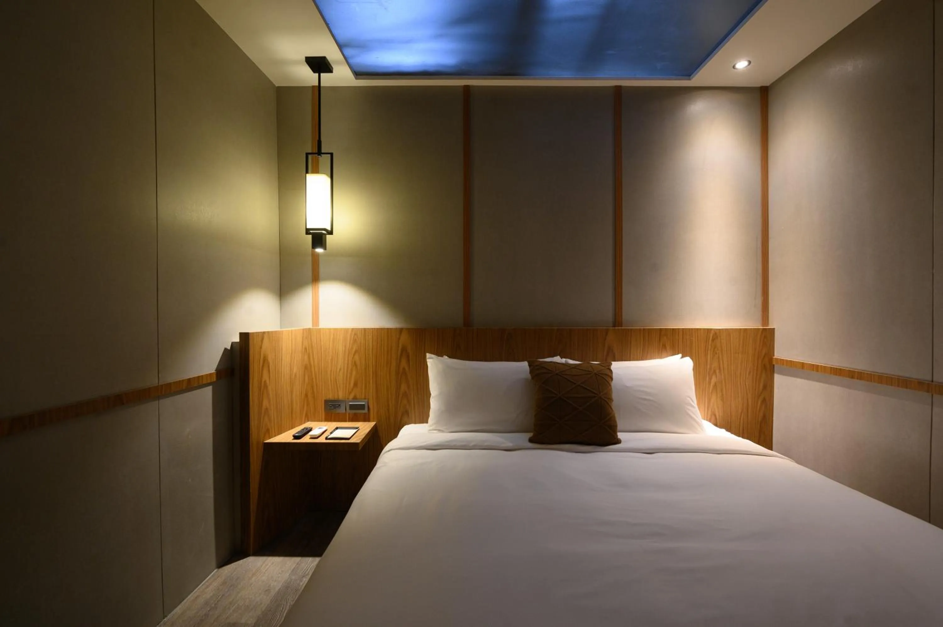 Bed in Yunoyado Onsen Hot Spring Hotel Deyang