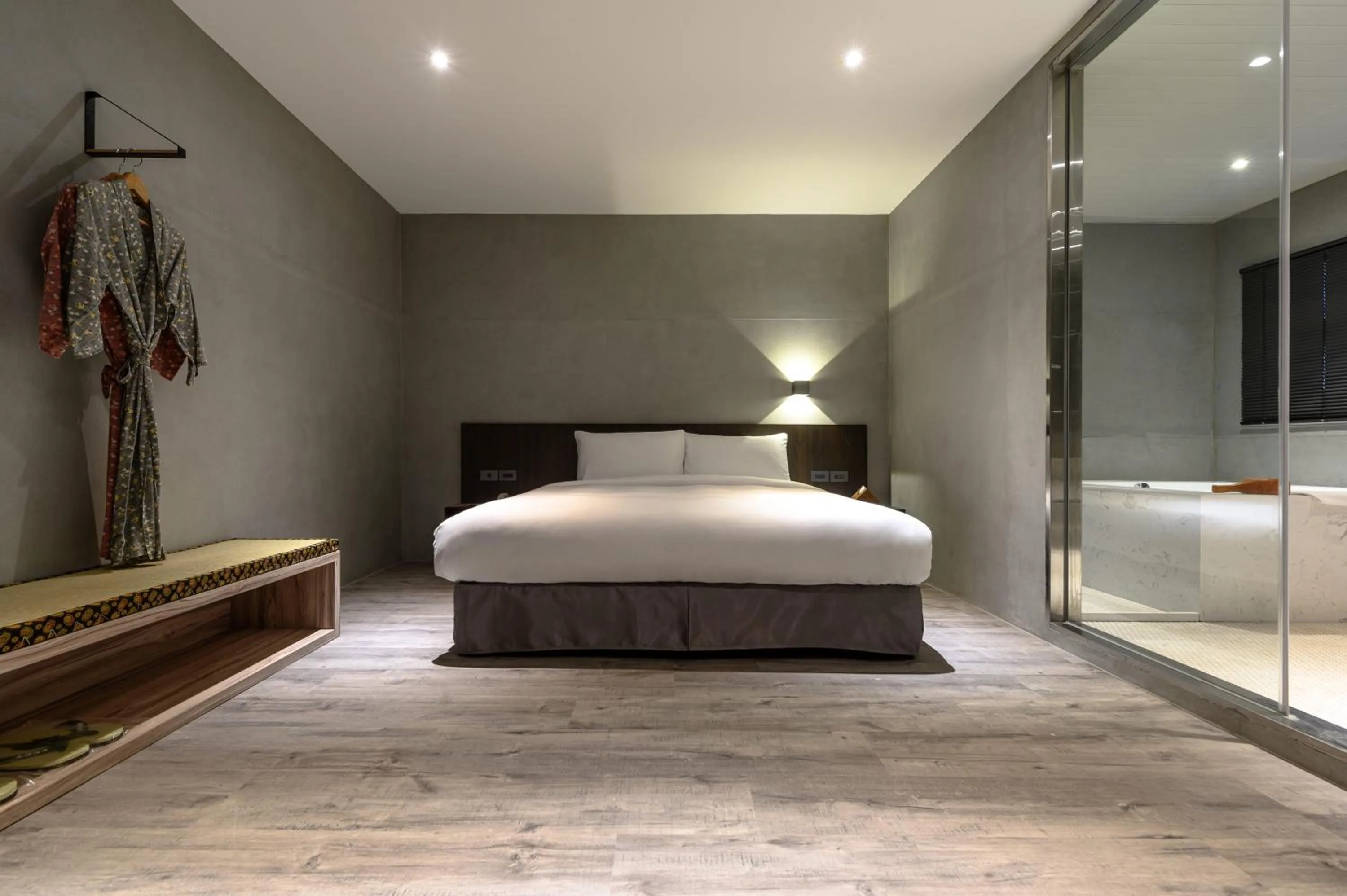 Bed in Yunoyado Onsen Hot Spring Hotel Deyang