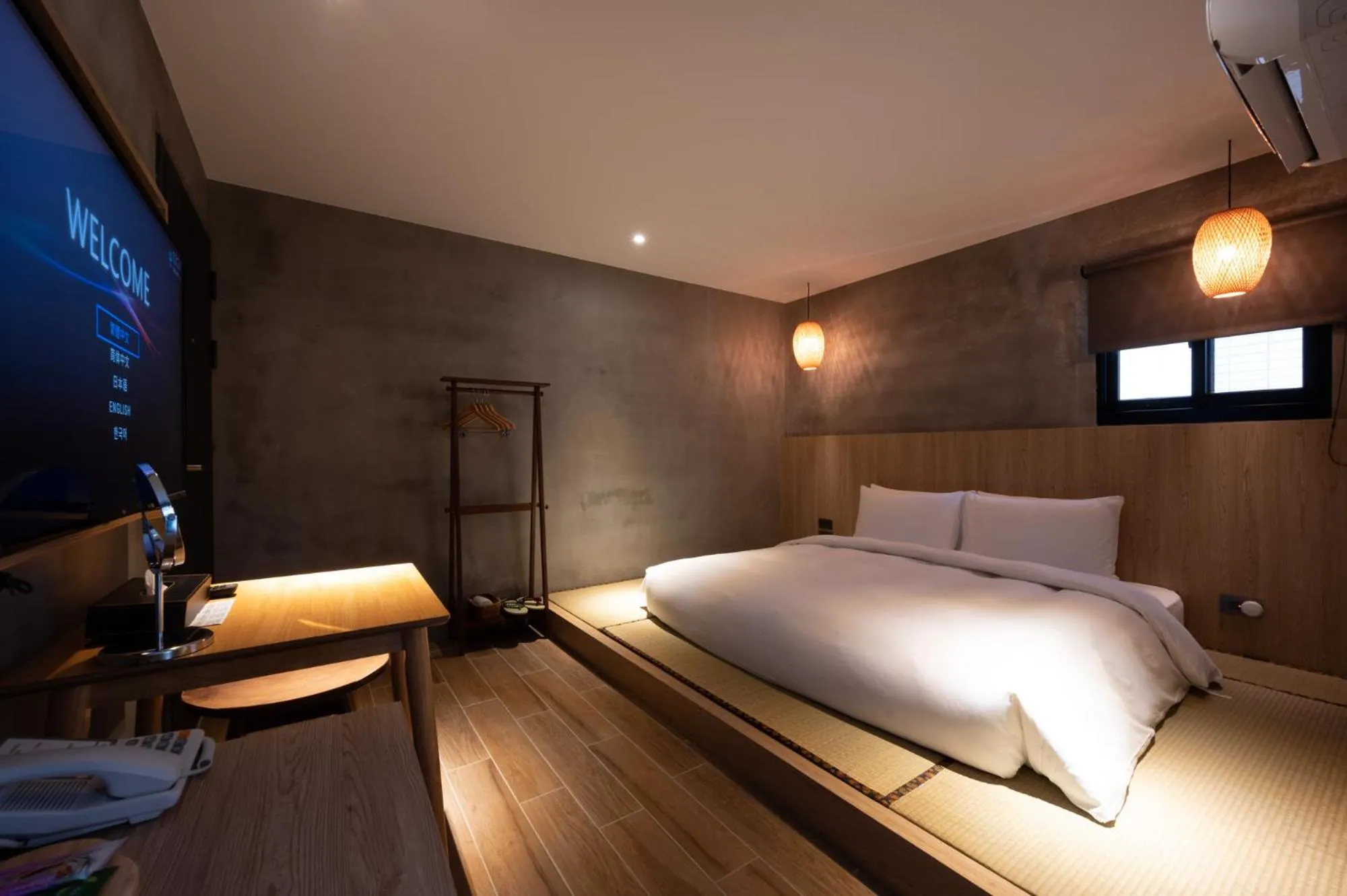 Bed in Yunoyado Onsen Hot Spring Hotel Deyang