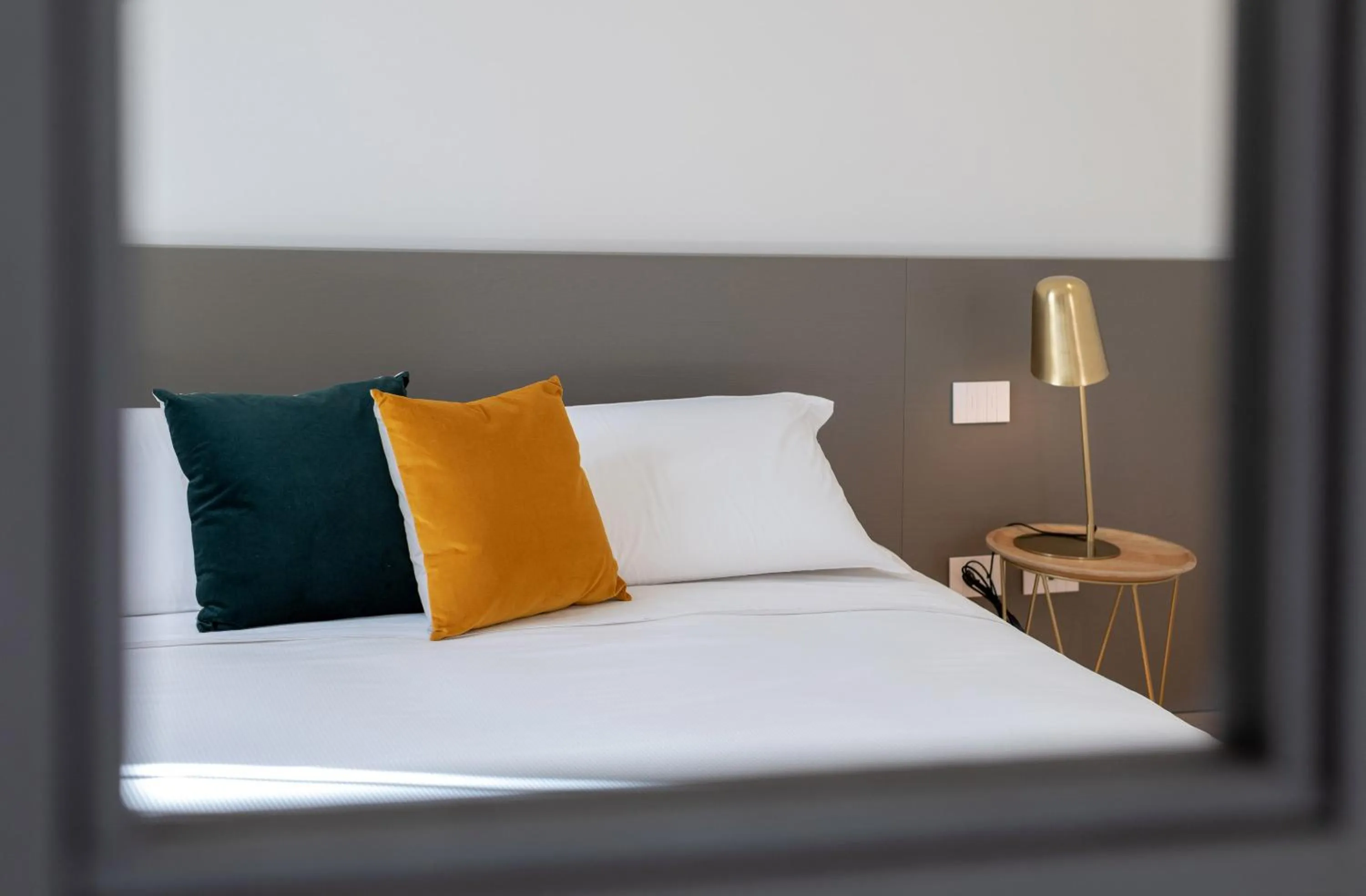 Bed in Le Palmette Suites