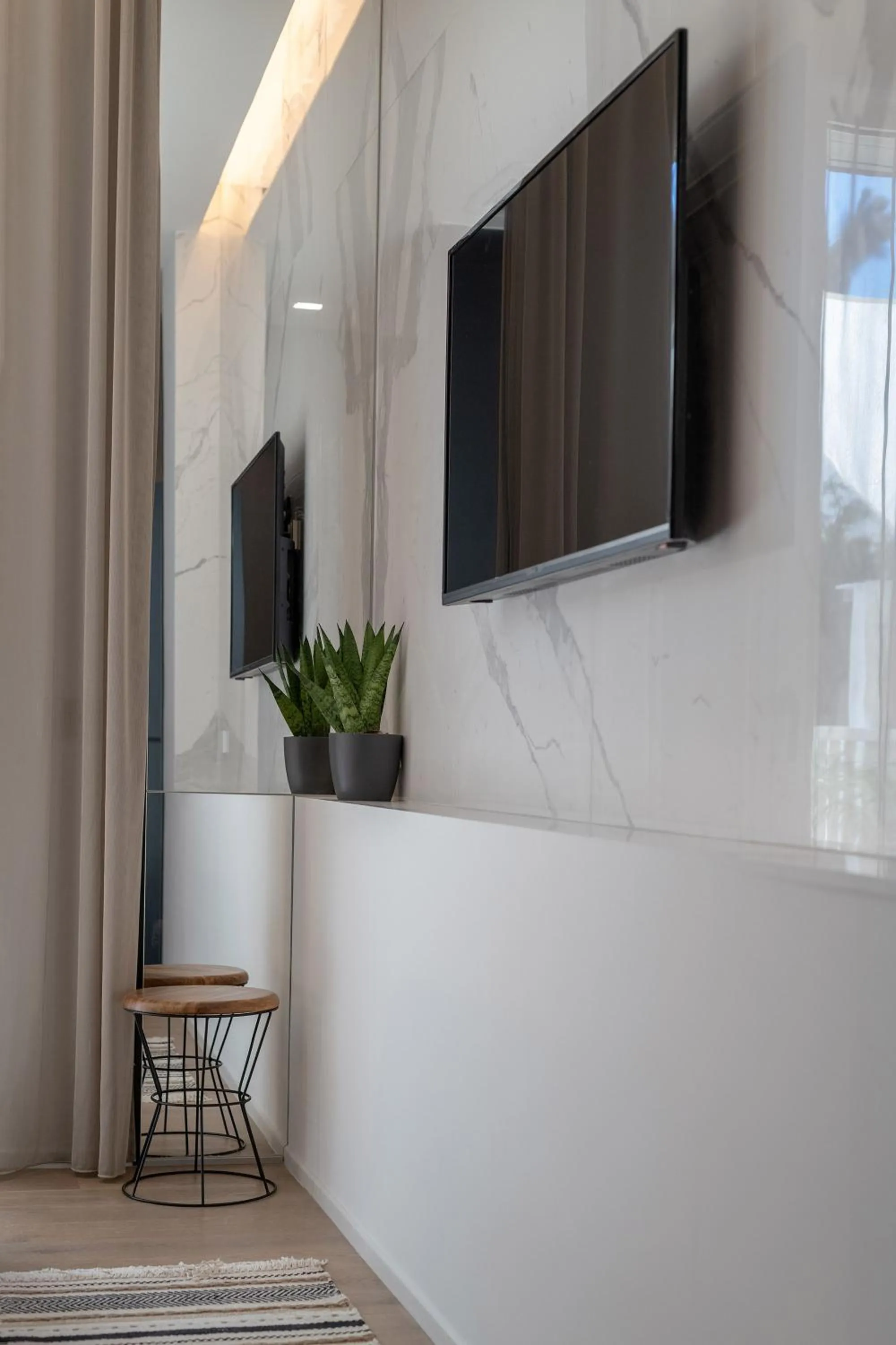 TV and multimedia in Le Palmette Suites