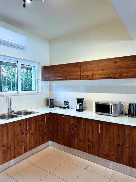 Kitchen or kitchenette in Azure Beach Villas