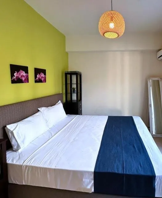 Bed in Azure Beach Villas