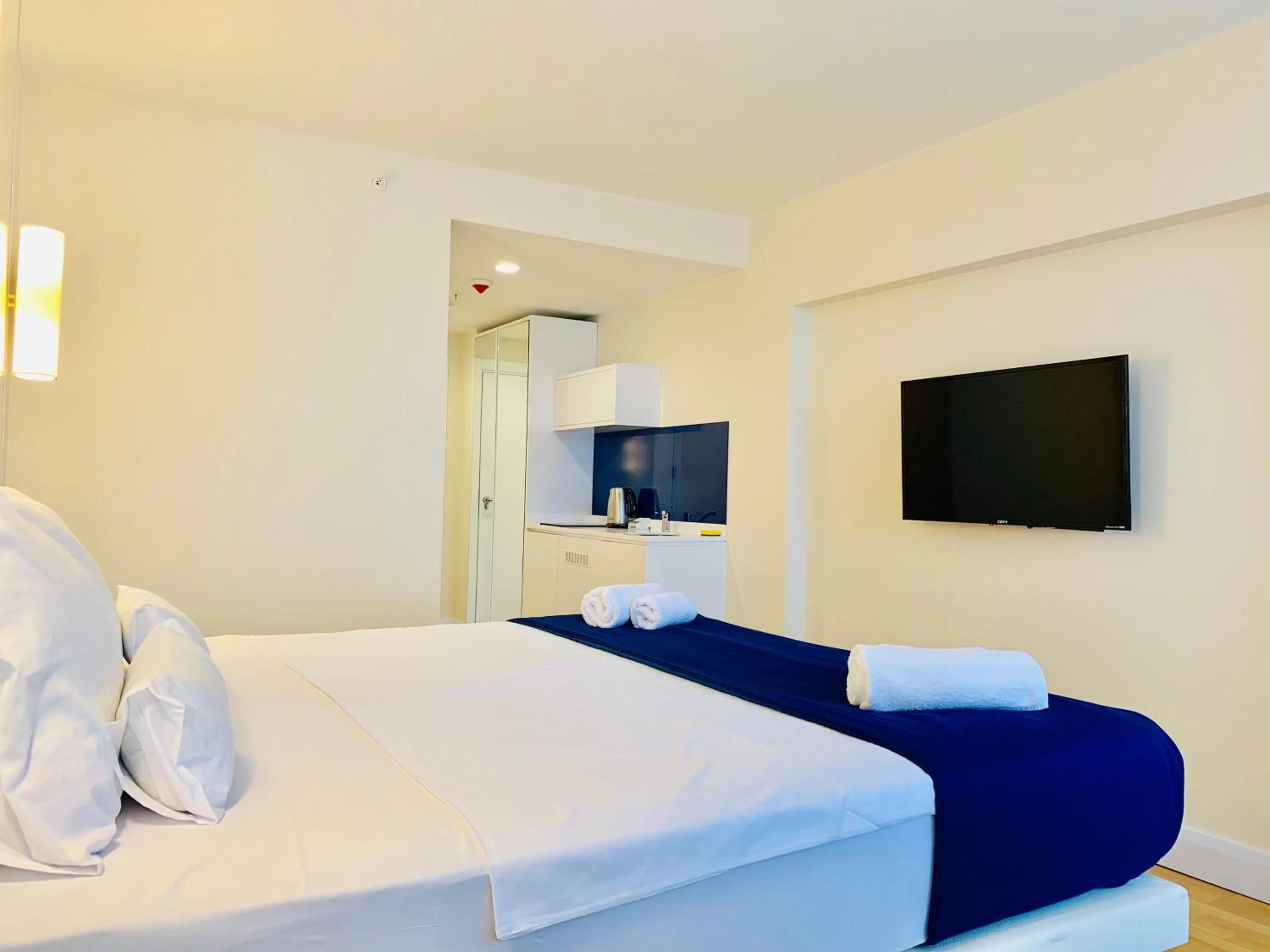 Bed in Royal Sea Breeze Apartments