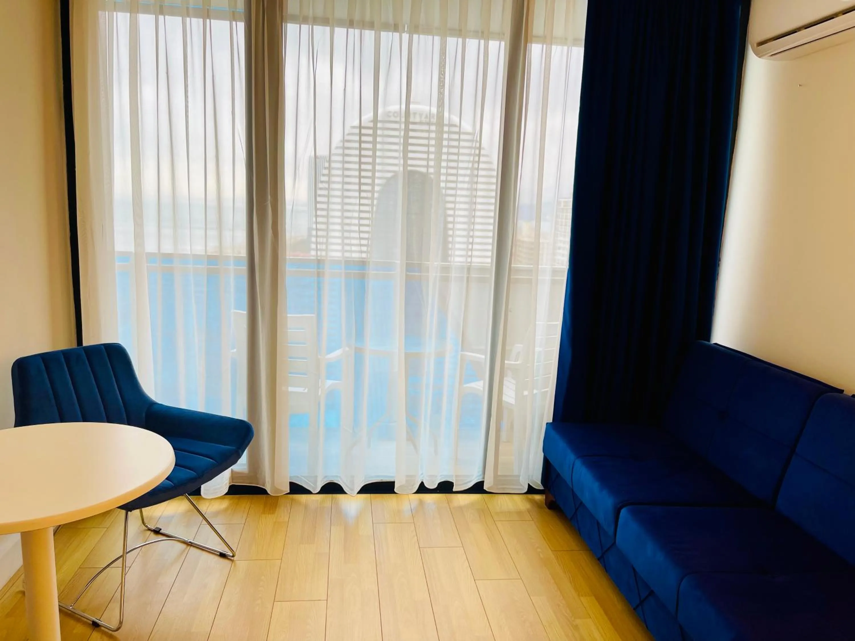 Seating area in Royal Sea Breeze Apartments