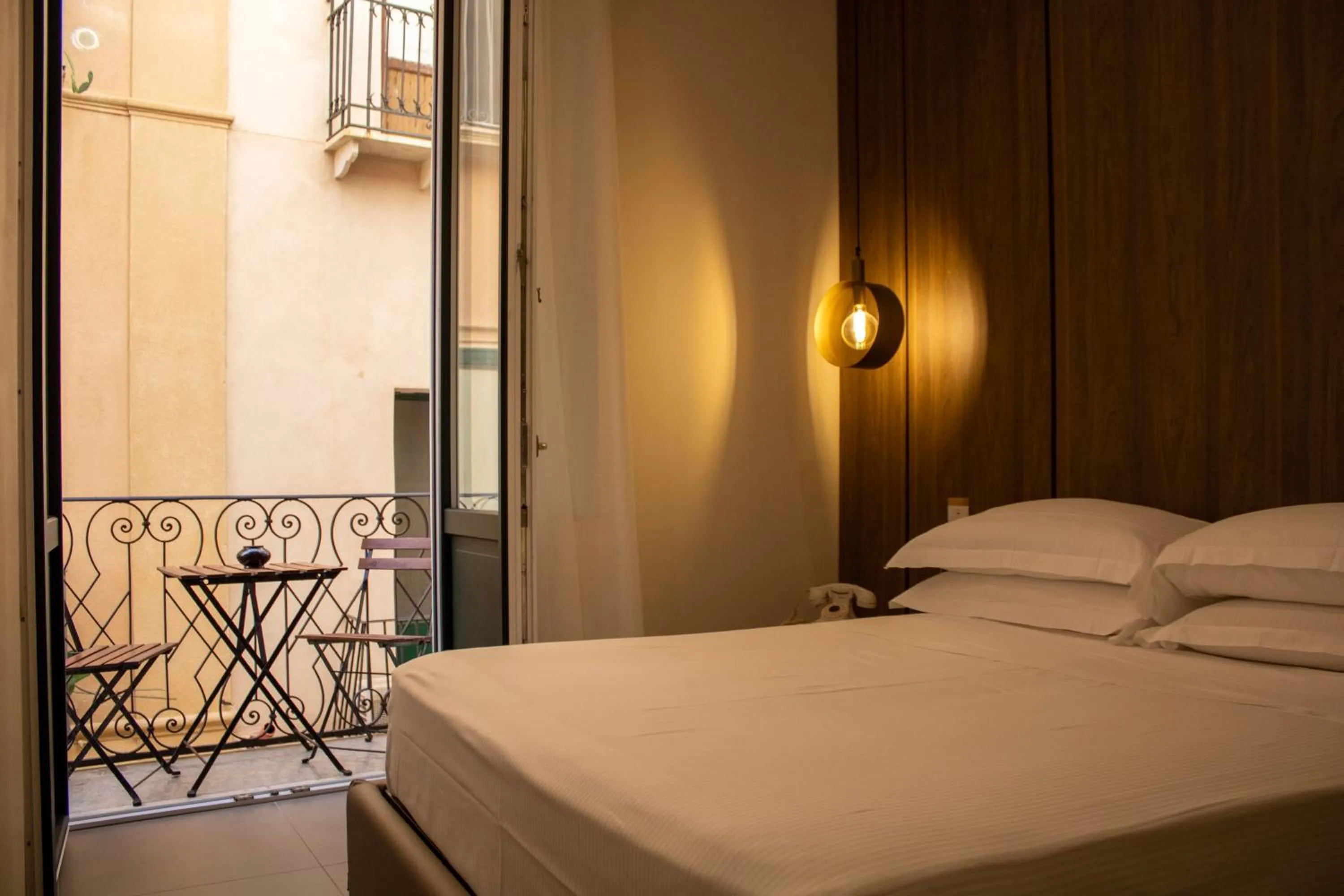 Bed in BADIA NUOVA Apart Hotel