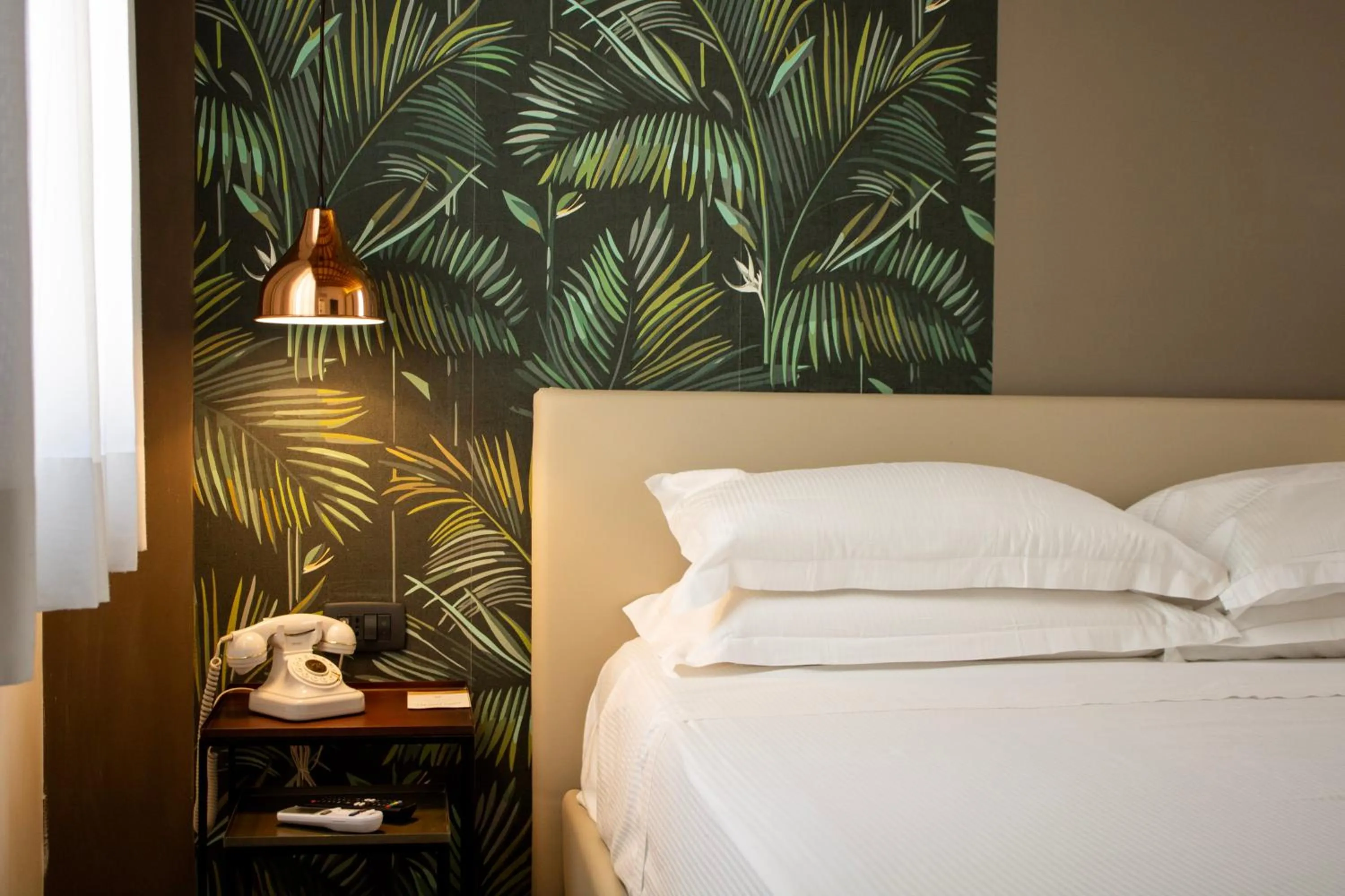 Bed in BADIA NUOVA Apart Hotel