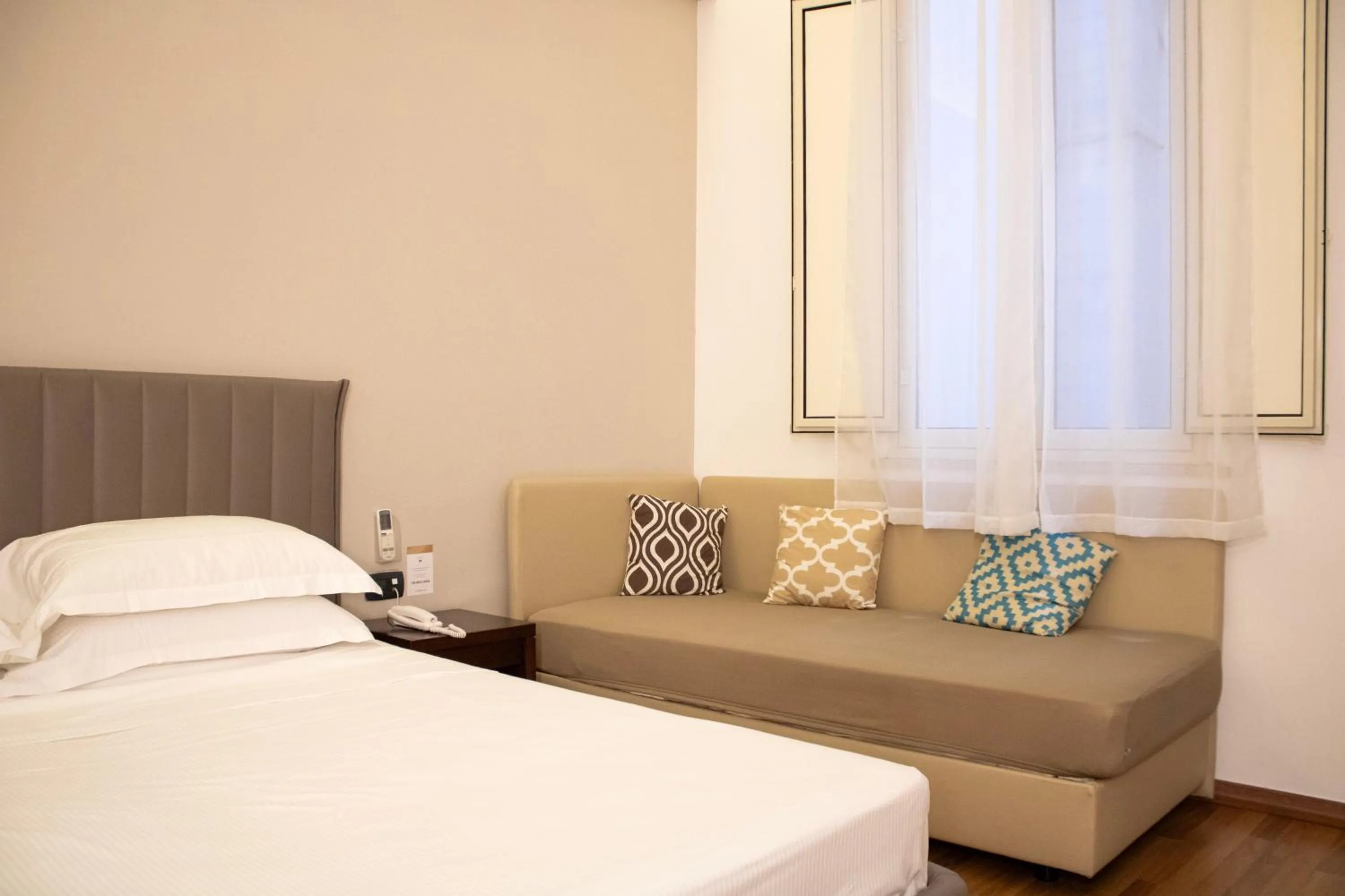 Bed in BADIA NUOVA Apart Hotel