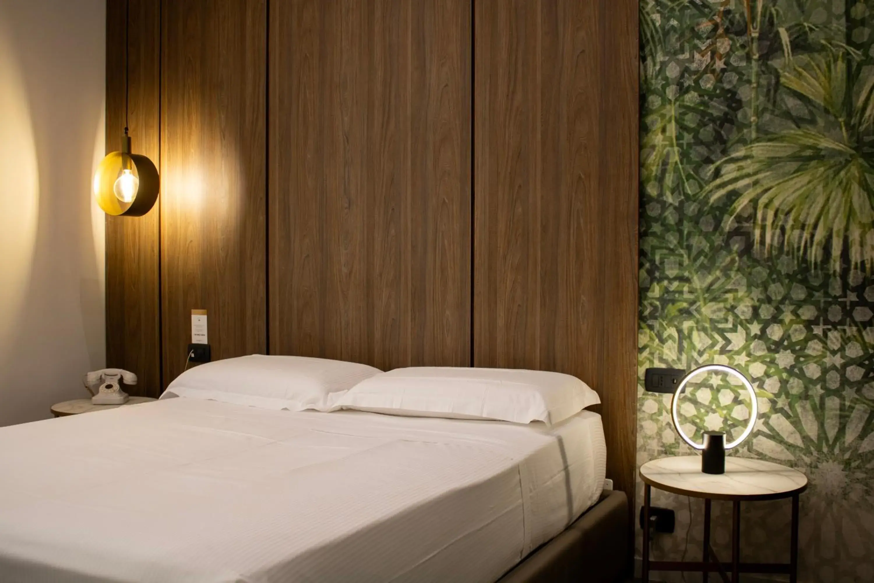 Bed in BADIA NUOVA Apart Hotel Bed in BADIA NUOVA Apart Hotel