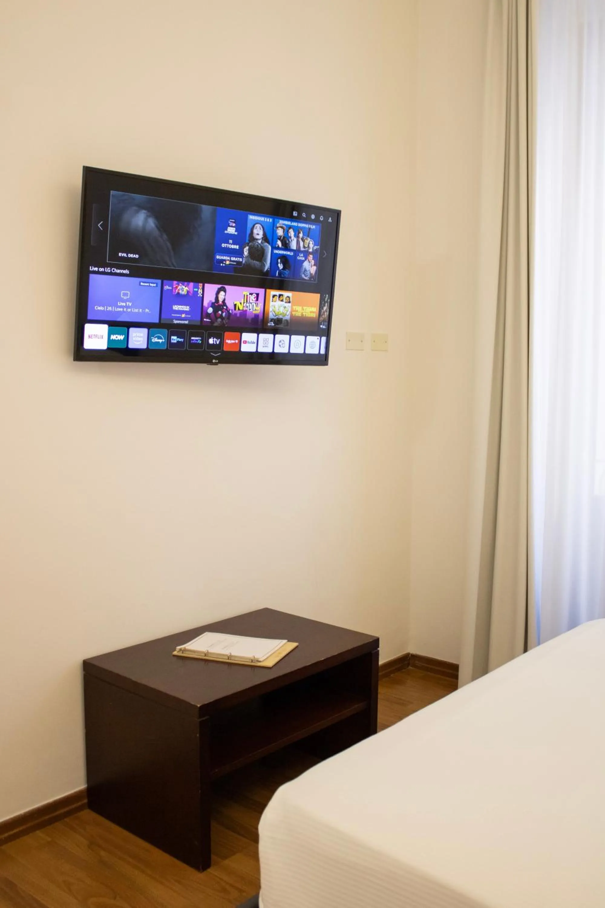 Bed in BADIA NUOVA Apart Hotel