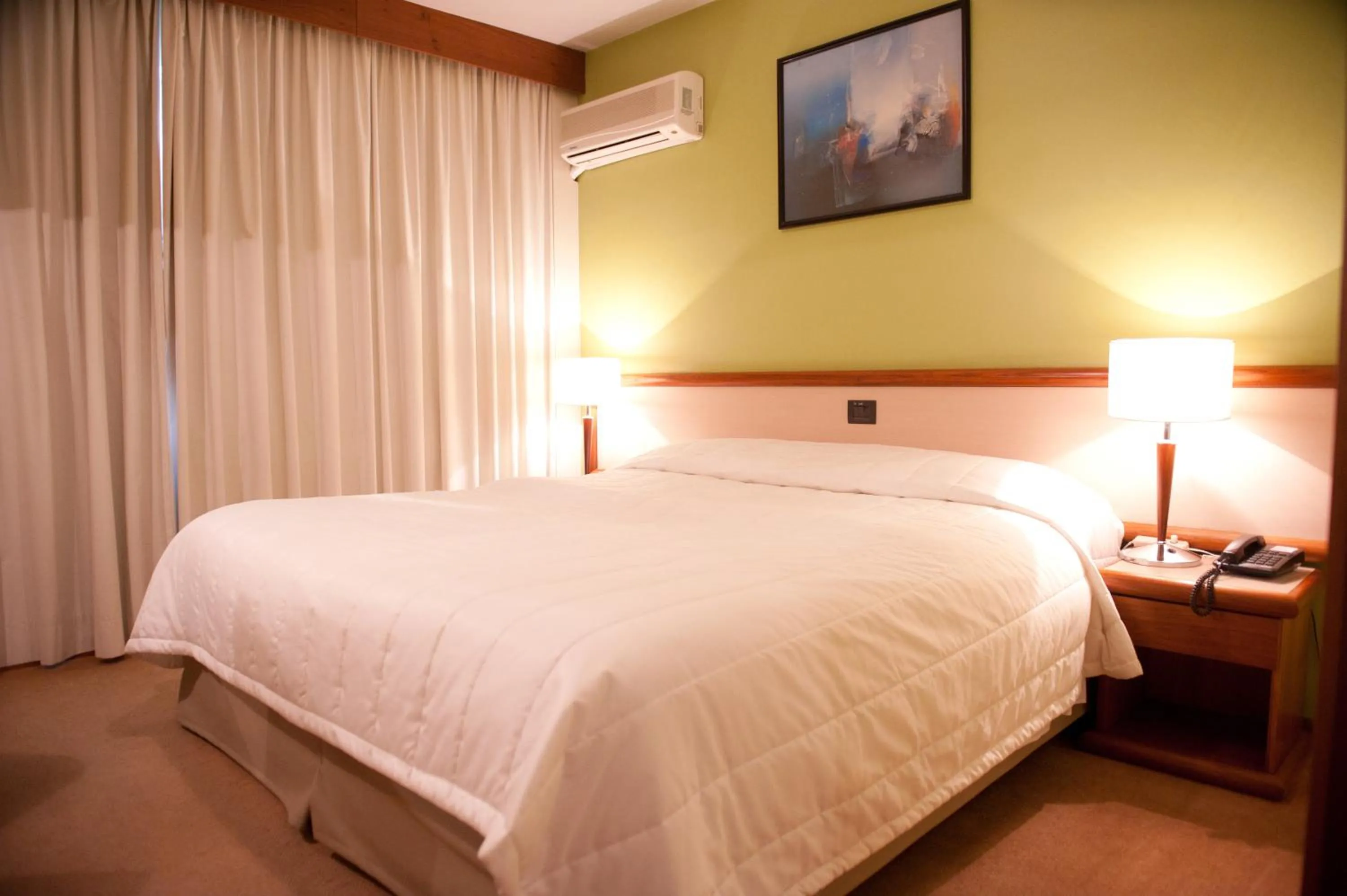 Bed in Maitá Palace Hotel