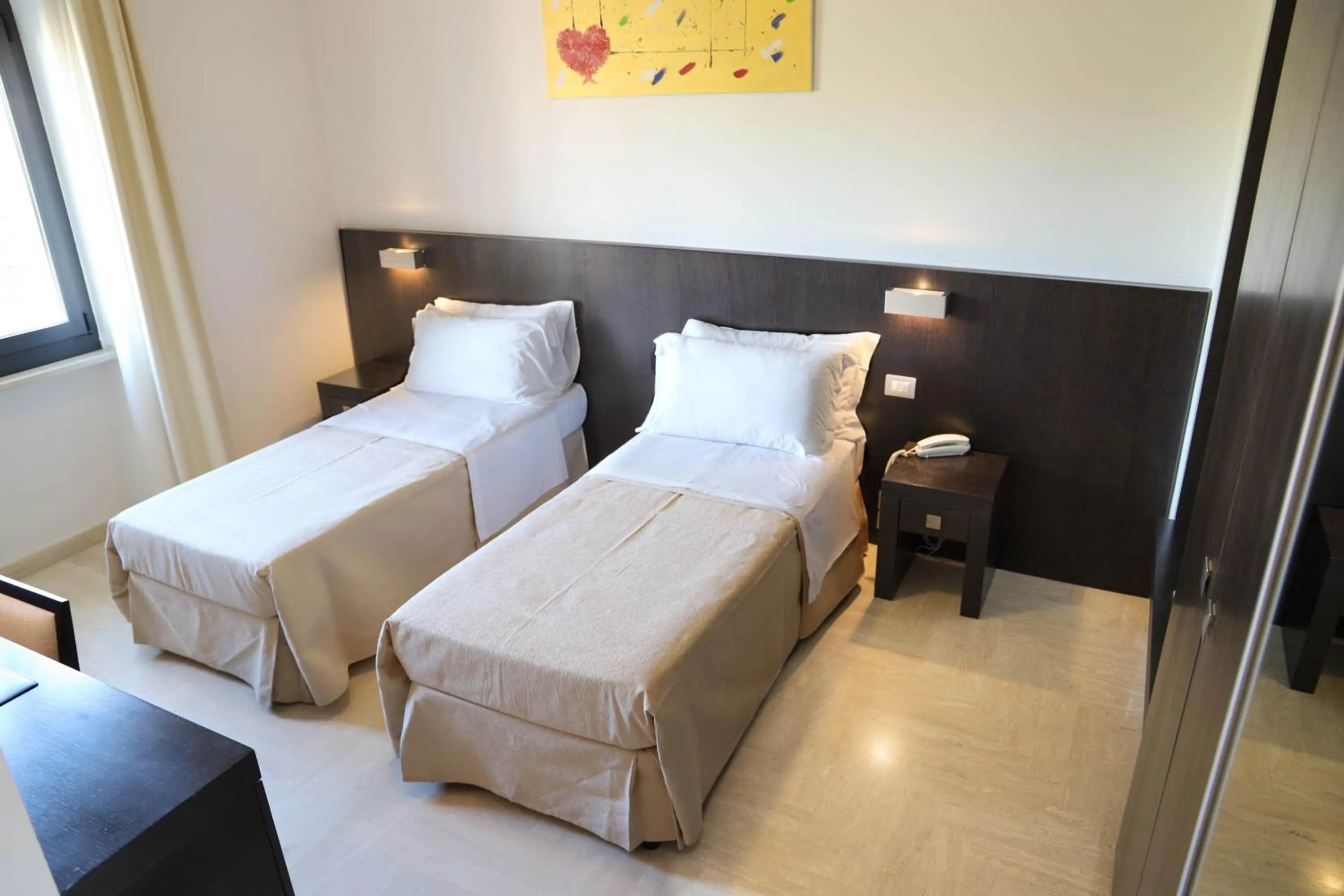 Bed in Albergo Cantiani