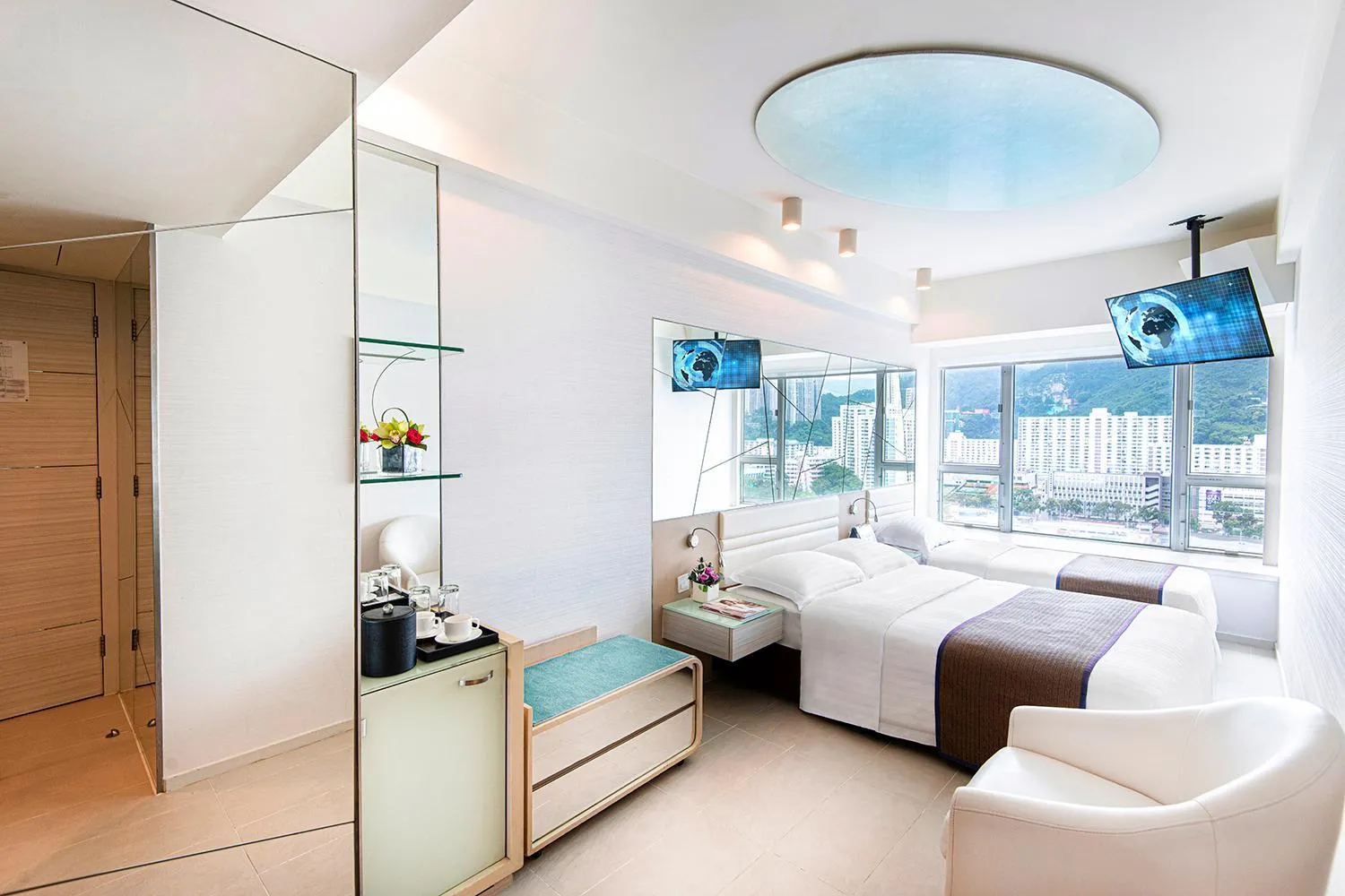 Bed in Regal Riverside Hotel