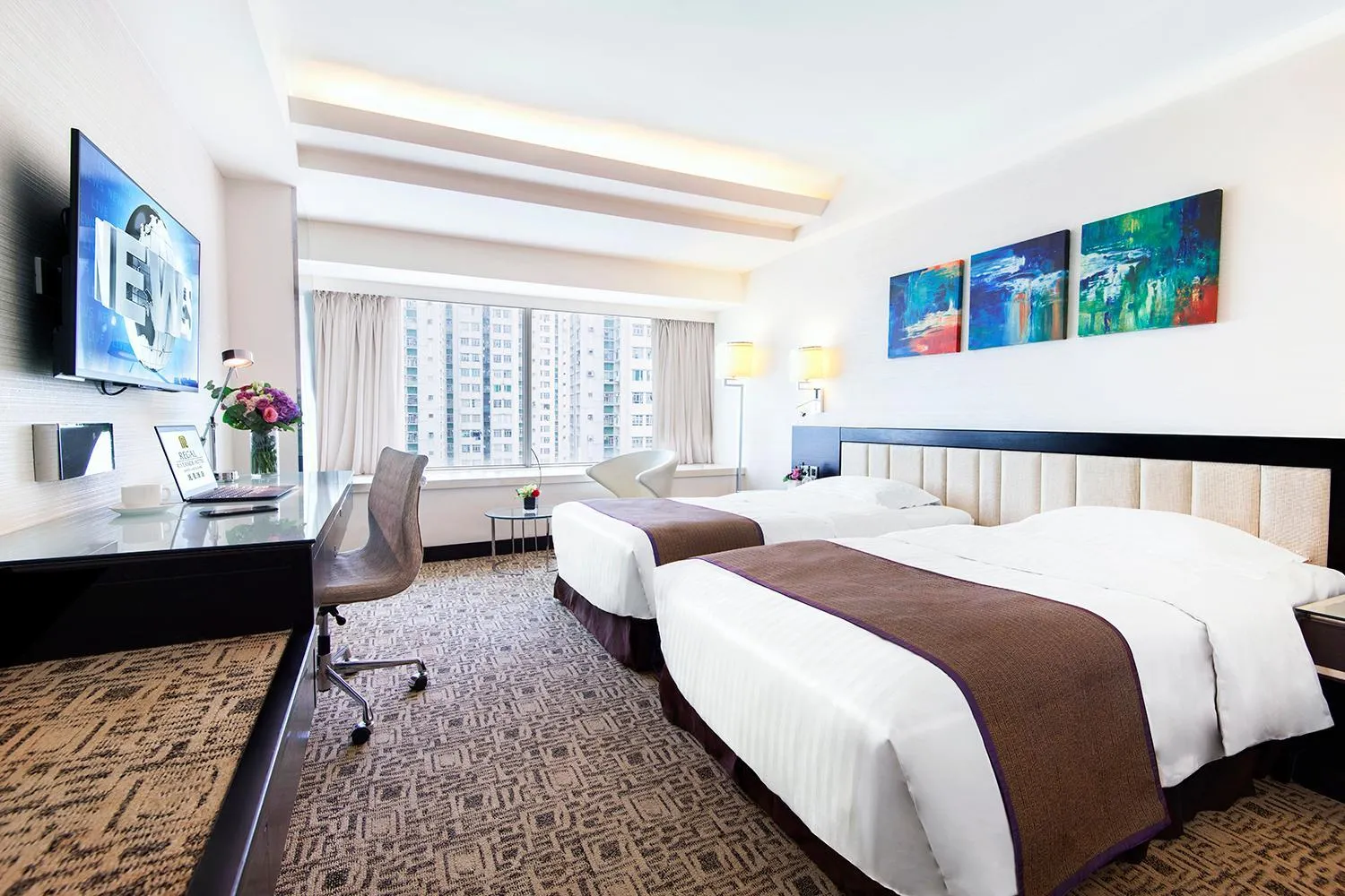 Bed in Regal Riverside Hotel