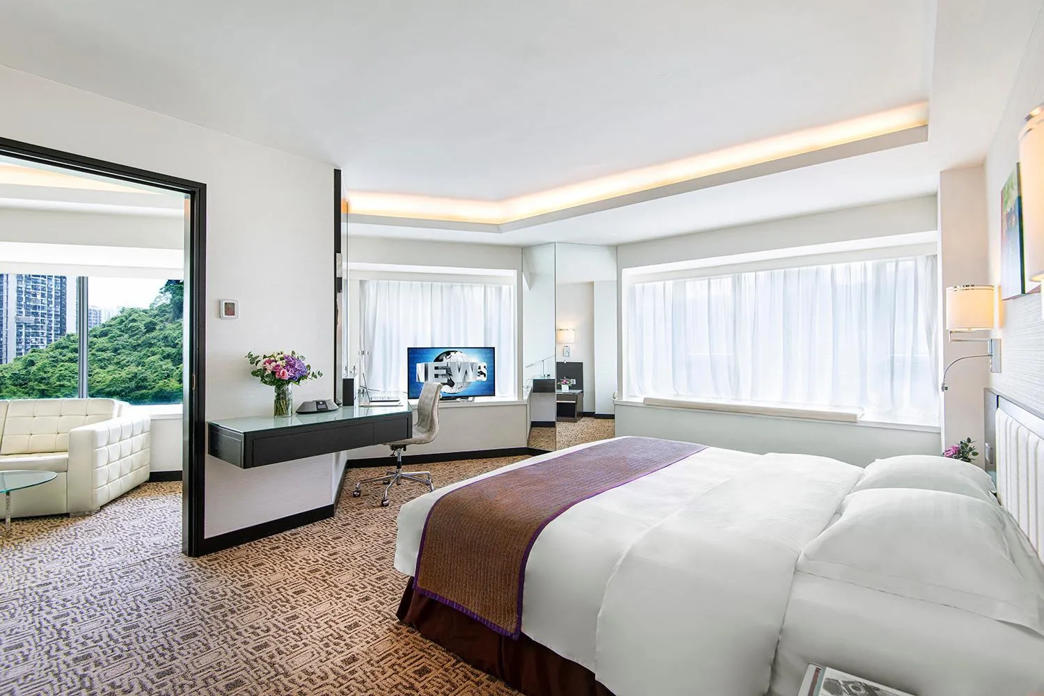 Bed in Regal Riverside Hotel