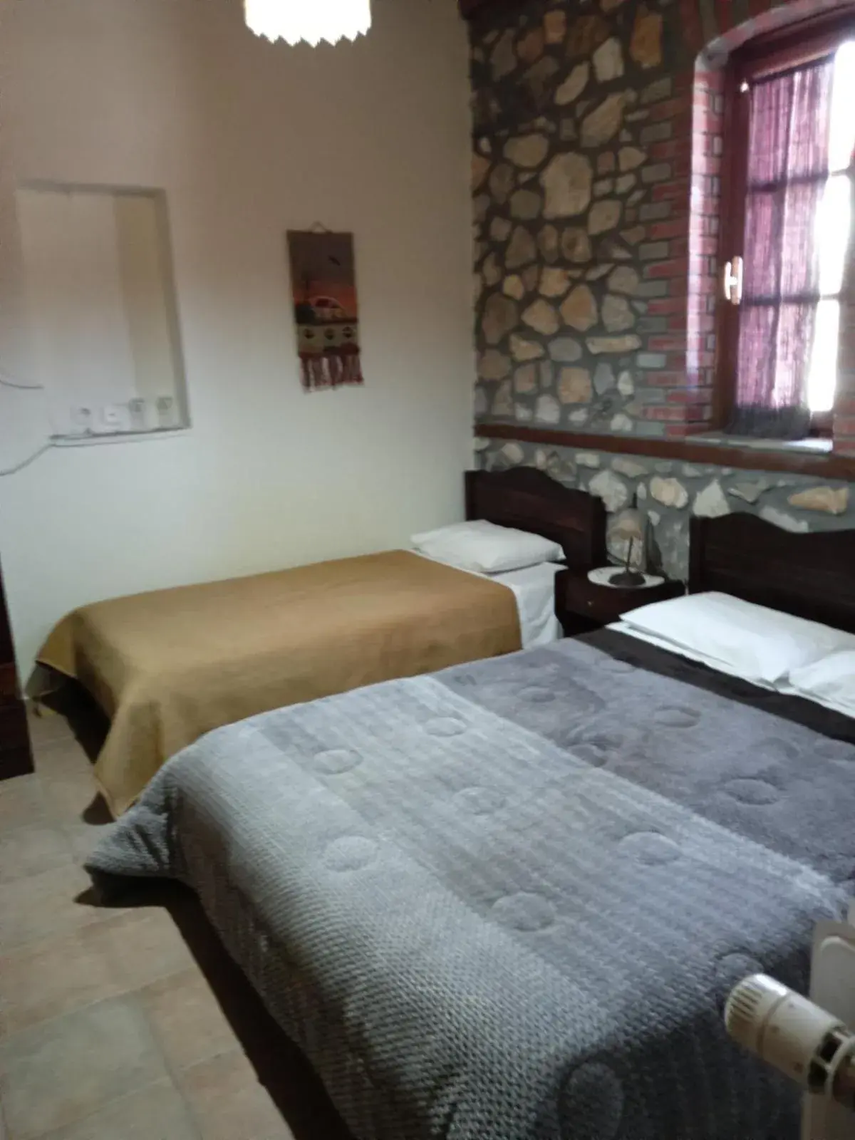 Classic Triple Room in Varnous Hotel Classic Triple Room in Varnous Hotel