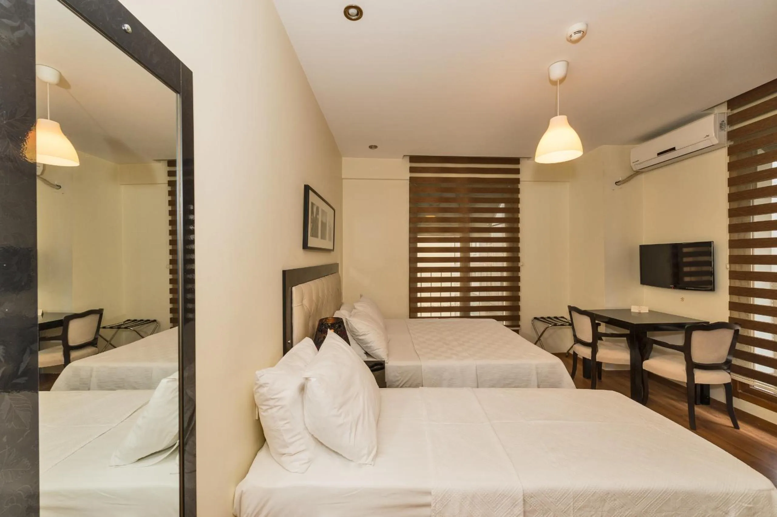 Bed in Invictum Residence