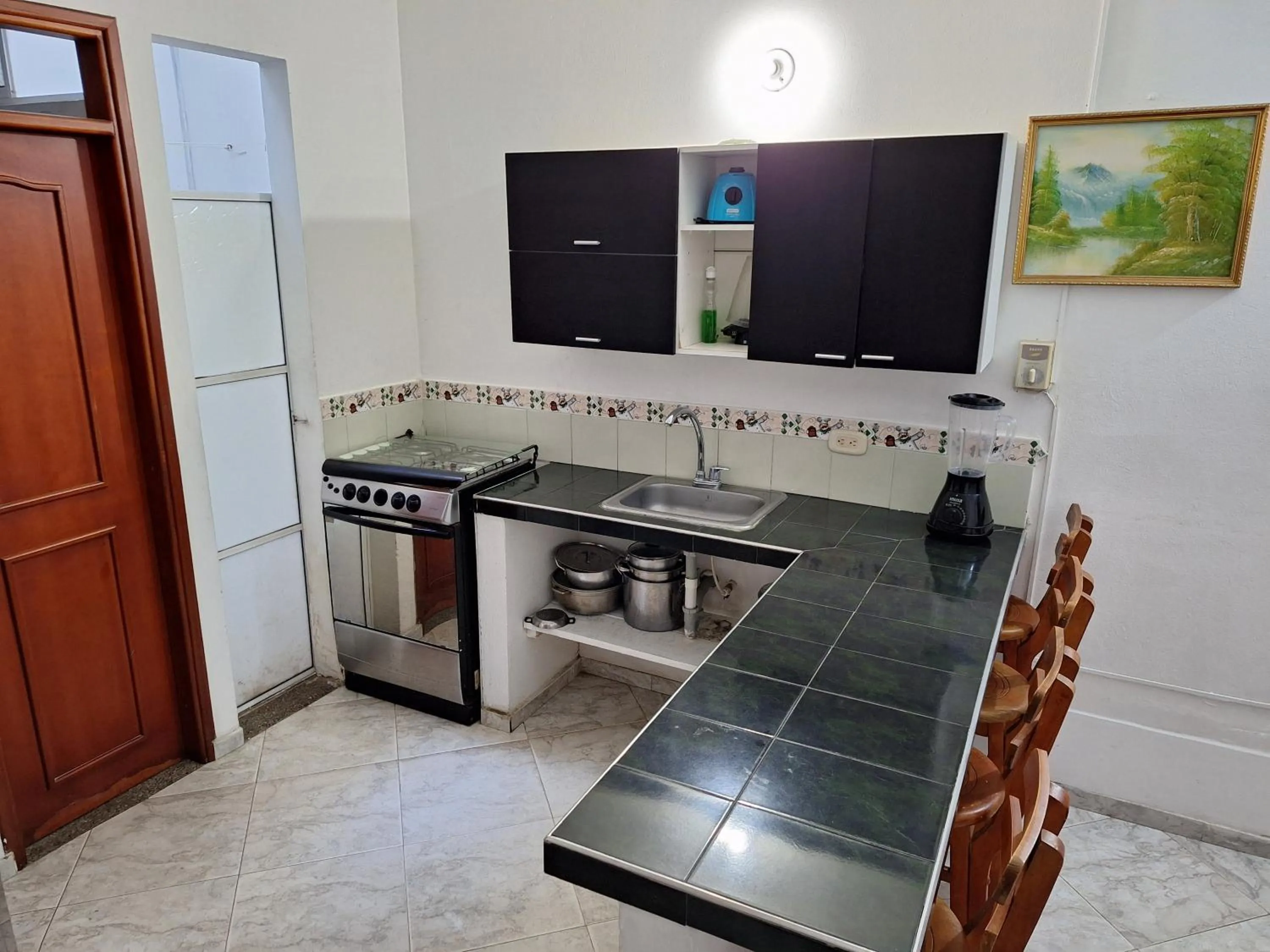 Kitchen or kitchenette in Apartahotel Tukasa Rodadero