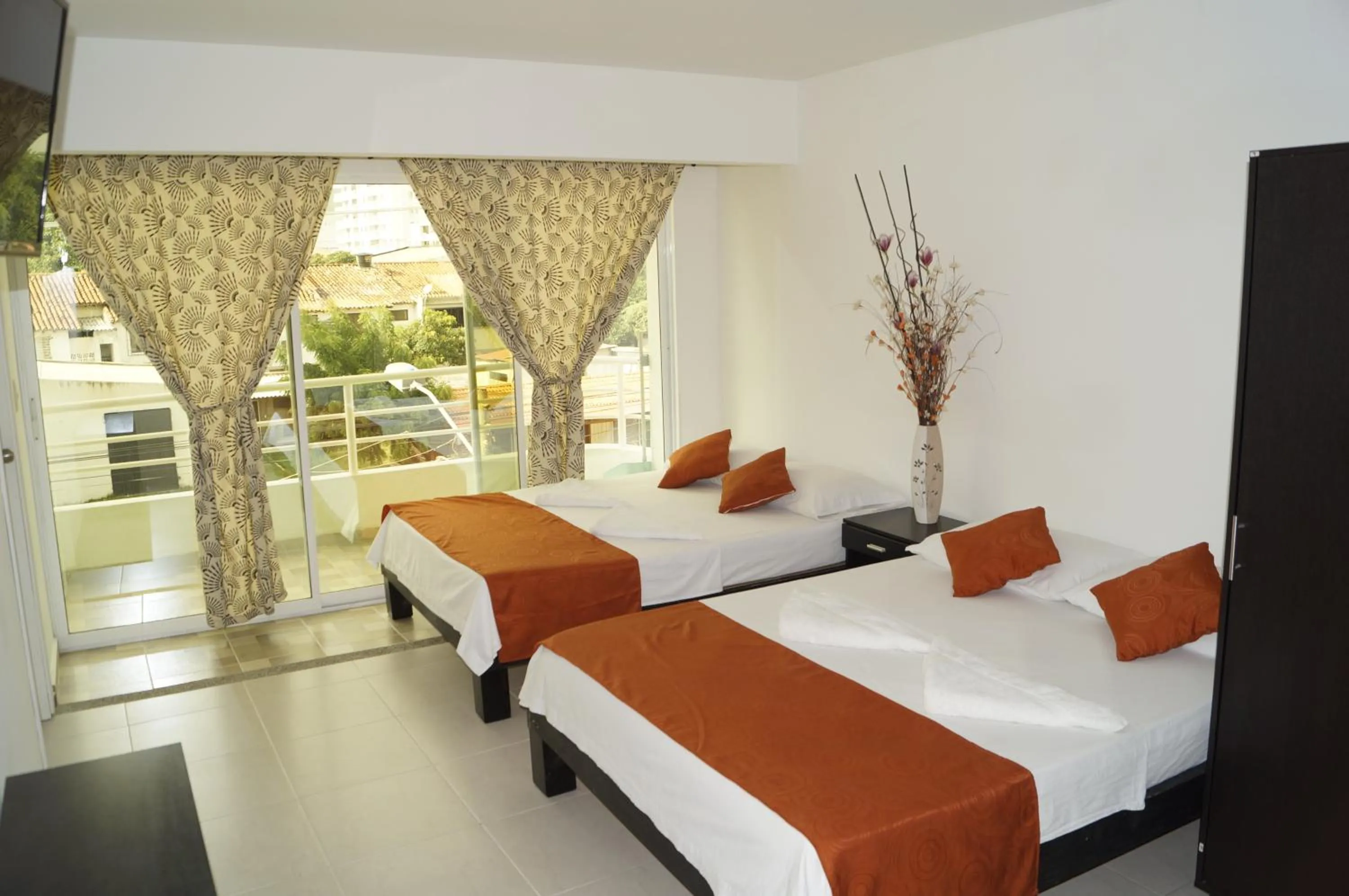 Photo of the whole room, Bed in Apartahotel Tukasa Rodadero