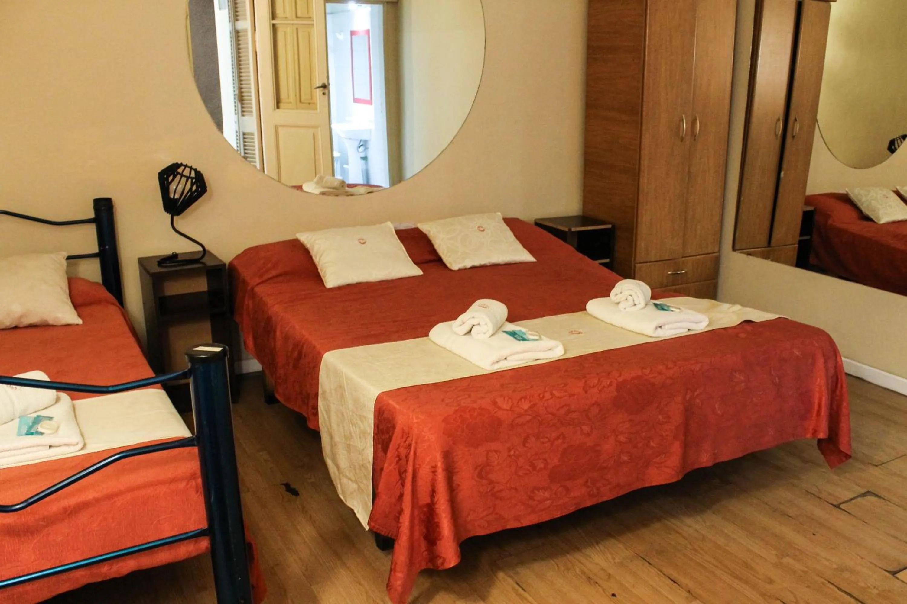 Bed in Casi Guemes Hotel