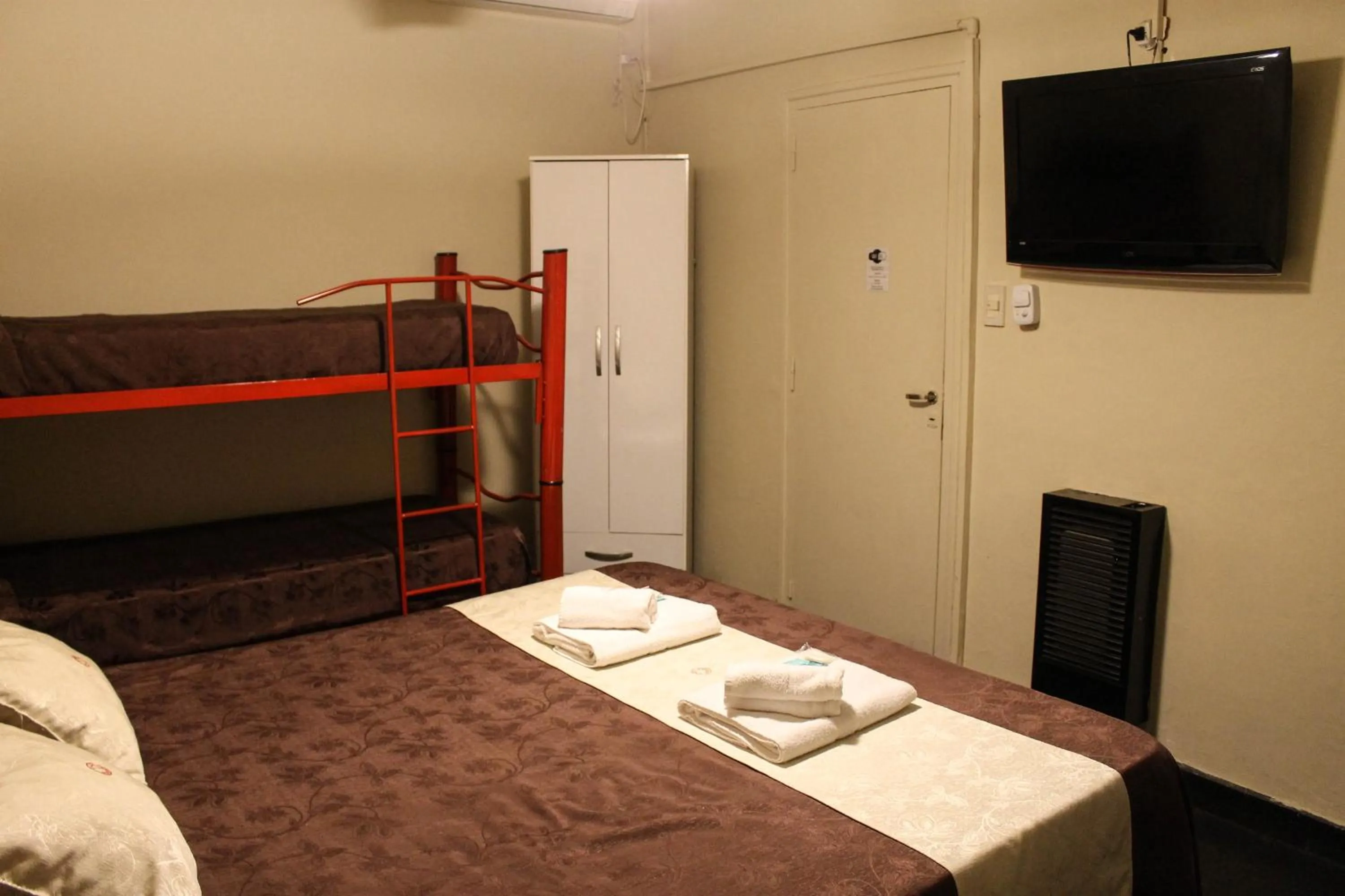 Bed in Casi Guemes Hotel