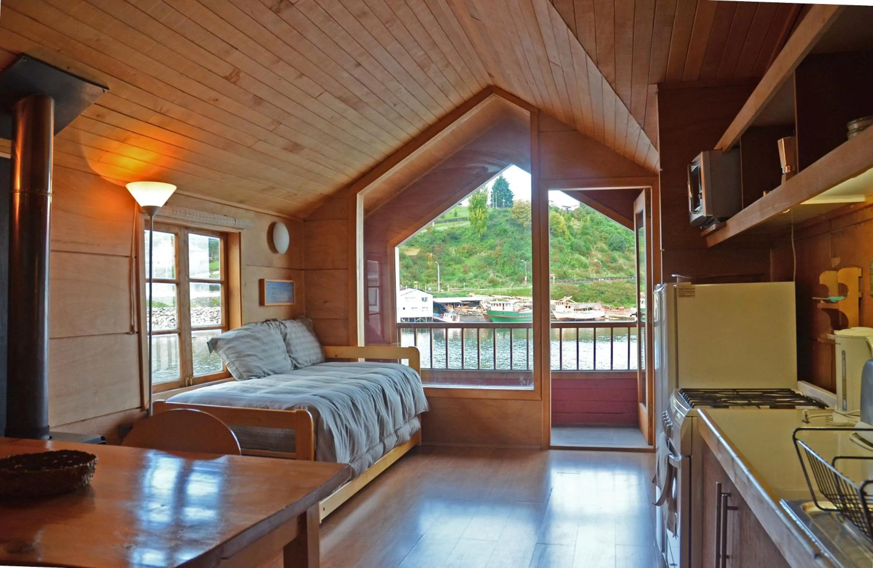 Kitchen or kitchenette, Bed in Palafito Azul Apart Hotel