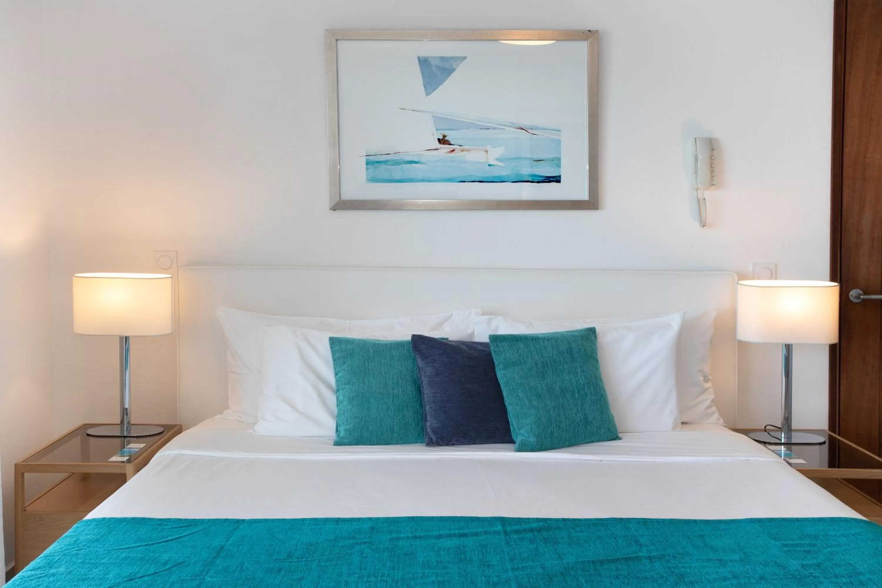 Bed in Bleu Emeraude Hotel