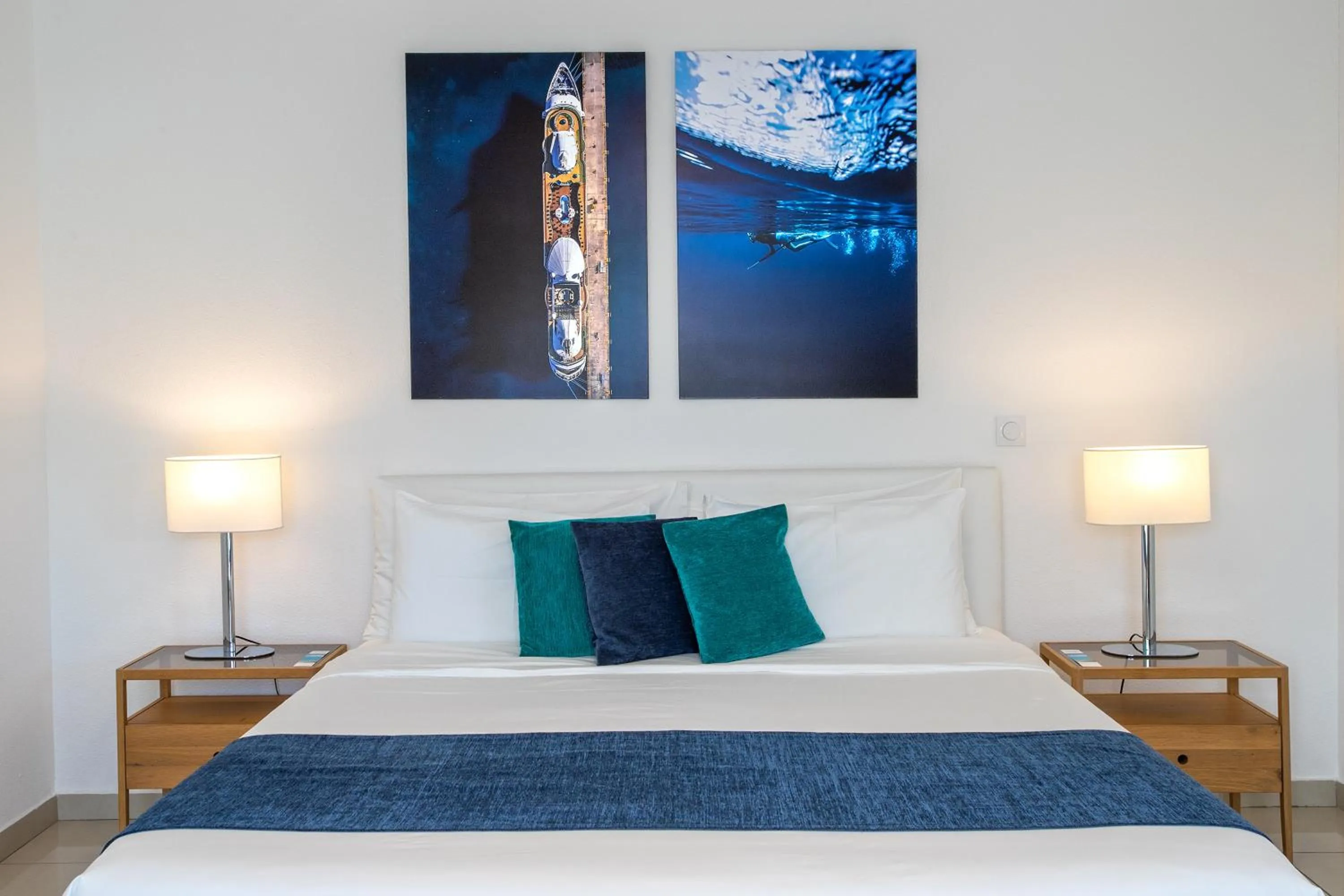 Bed in Bleu Emeraude Hotel