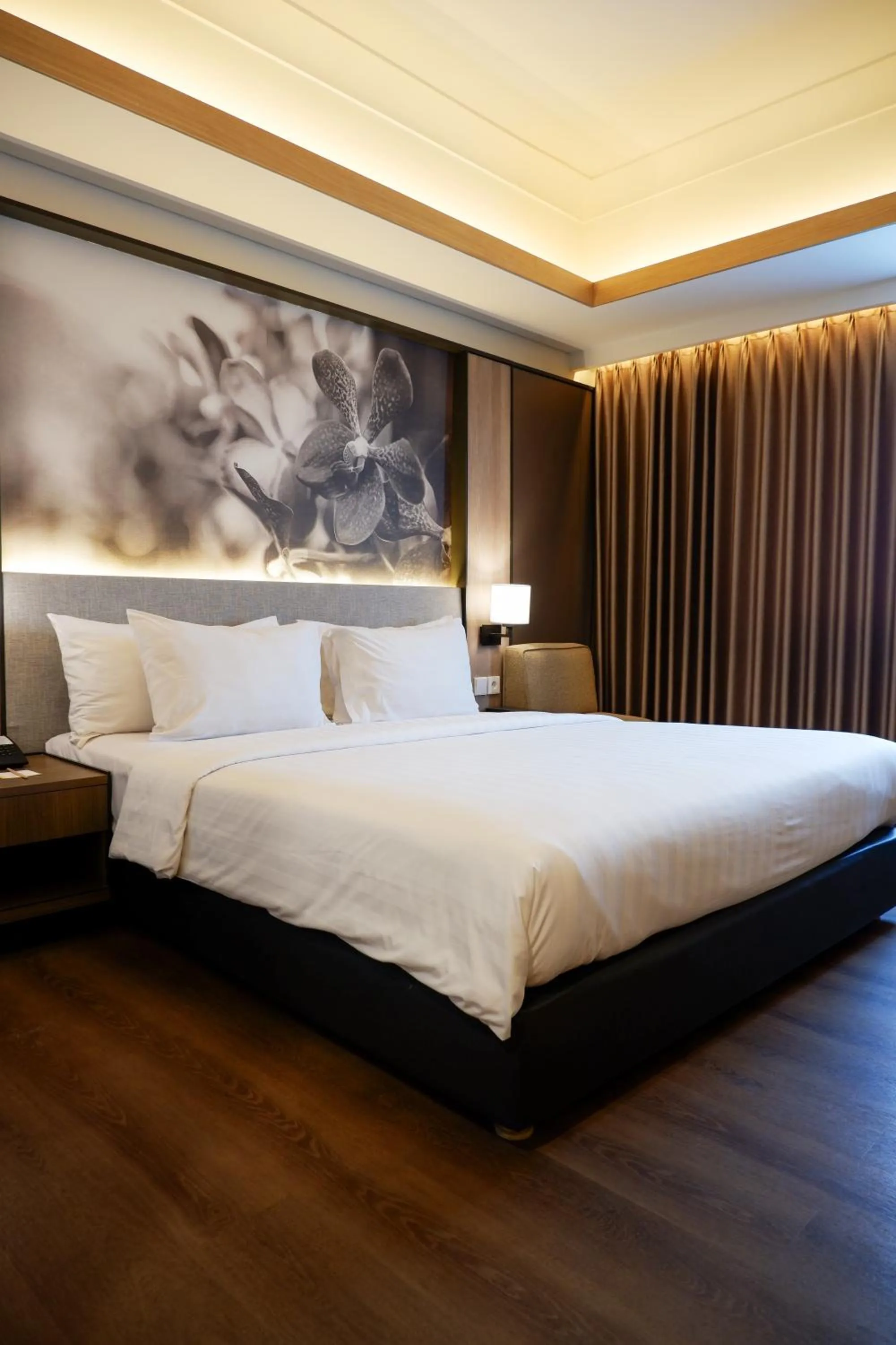 Bed in Orchardz Jayakarta