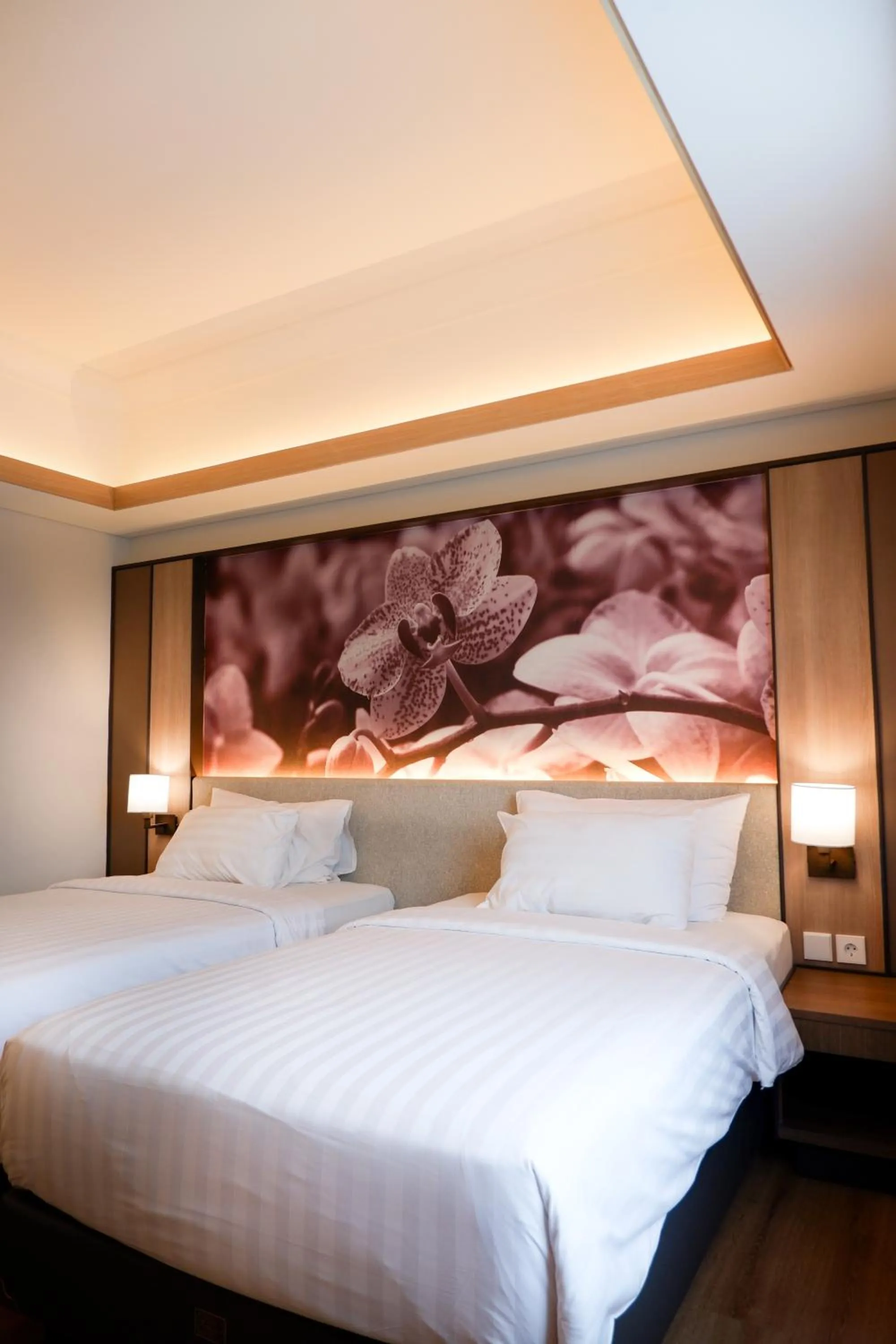 Bed in Orchardz Jayakarta