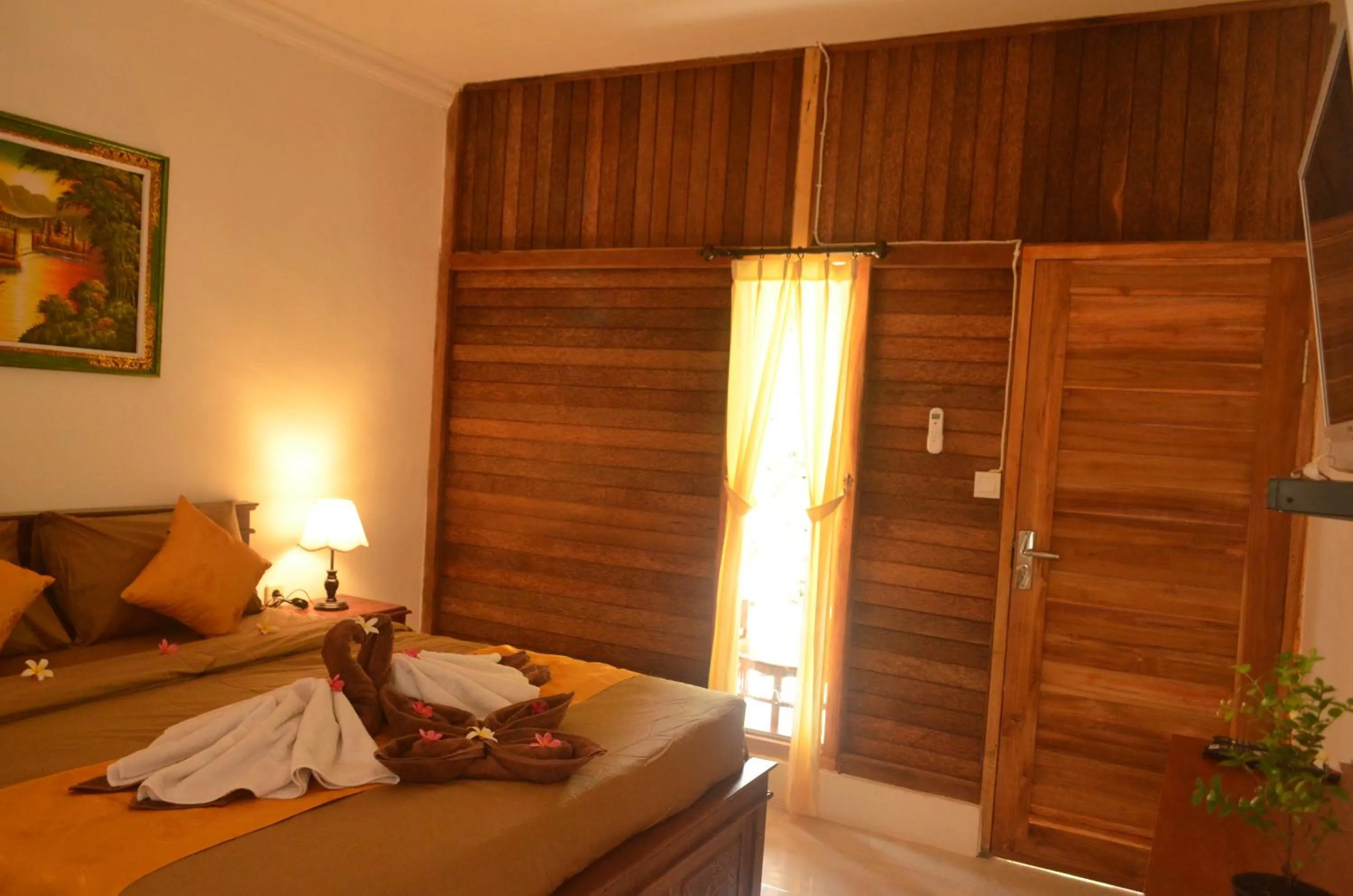 Bed in The Rahayu Cottage