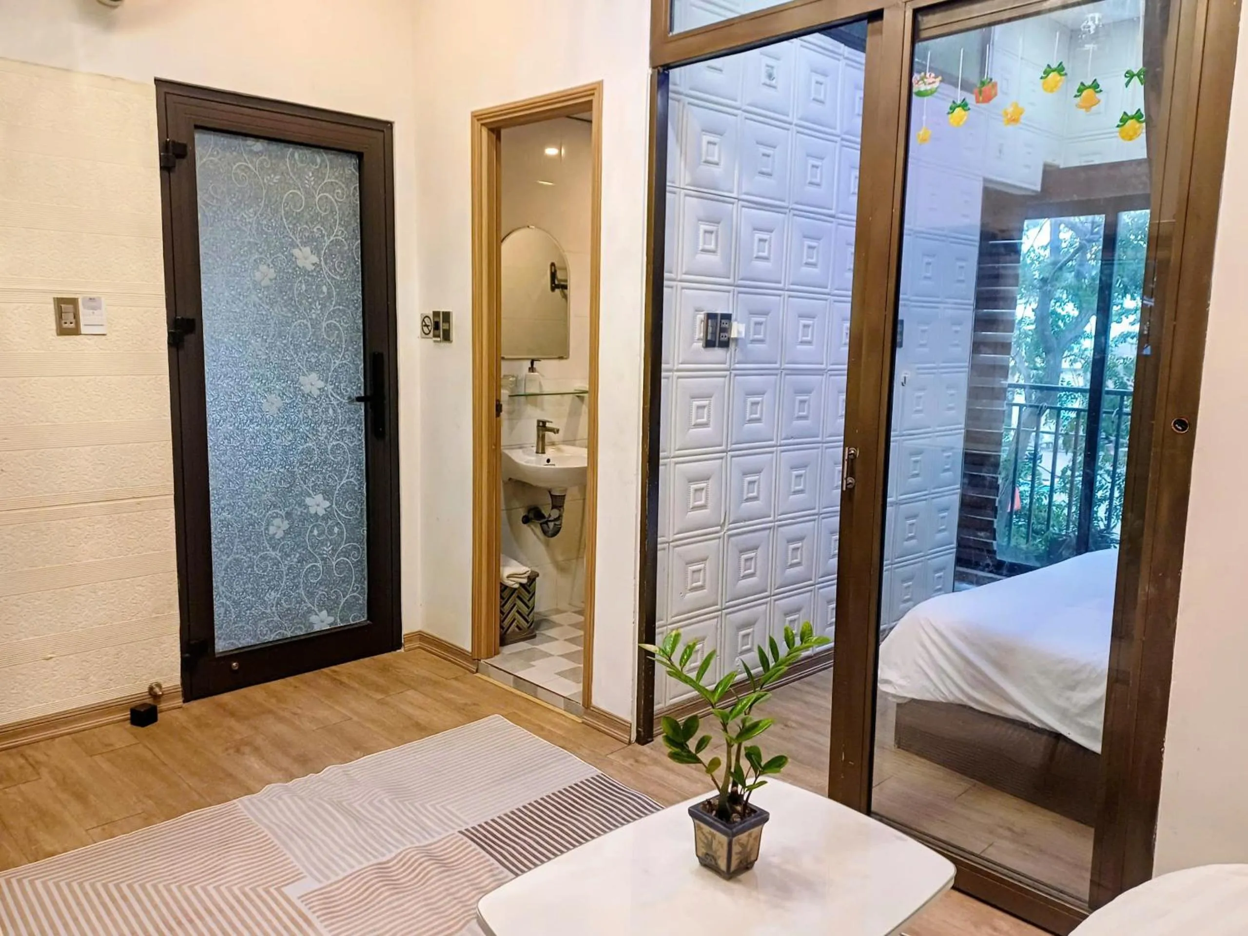 Living room, Bed in Seashine Apartment