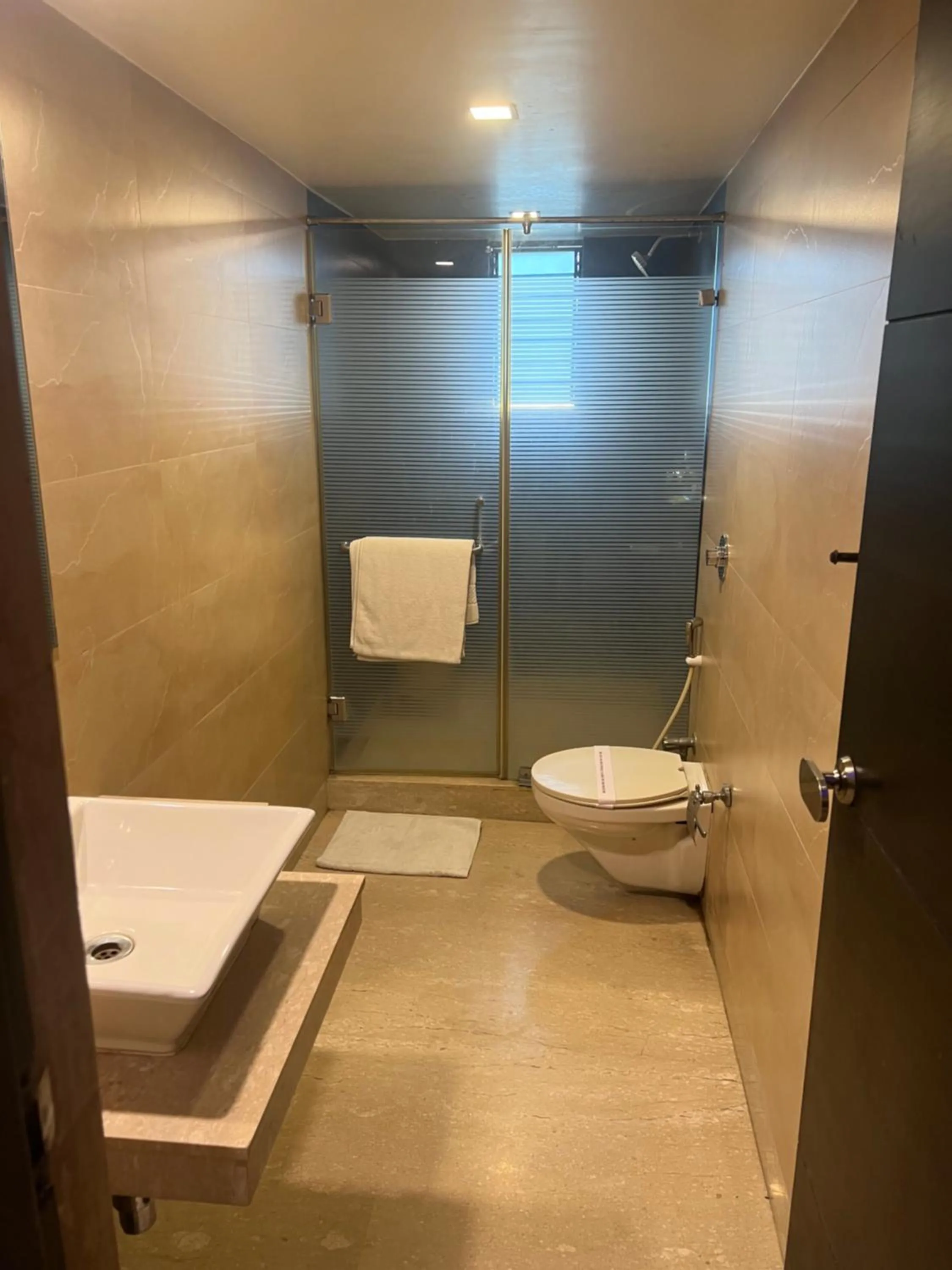 Toilet in Hotel Aston International